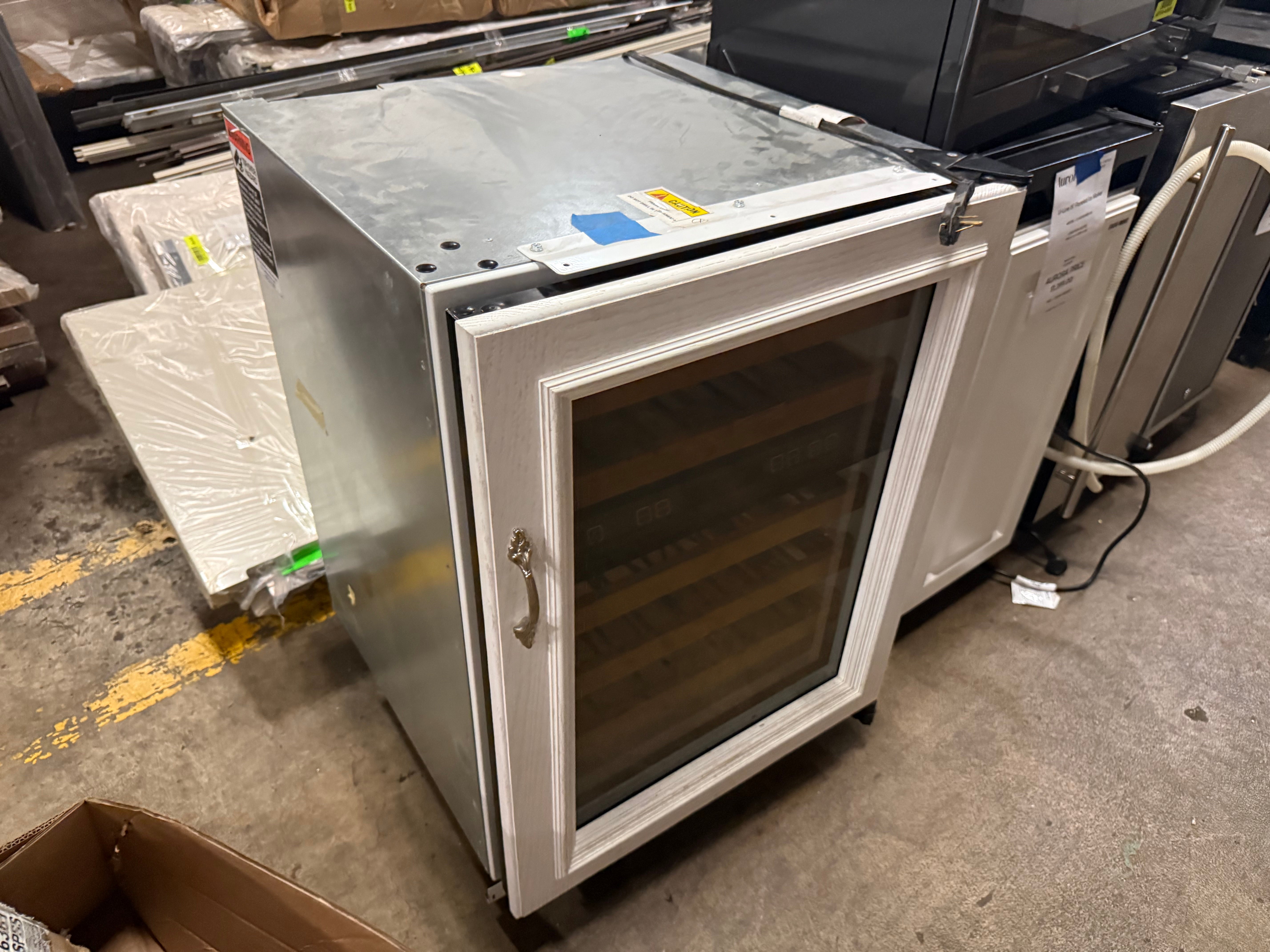 Sub Zero 424G glass door wine refrigerator showing dual zone digital controls inside cabinet