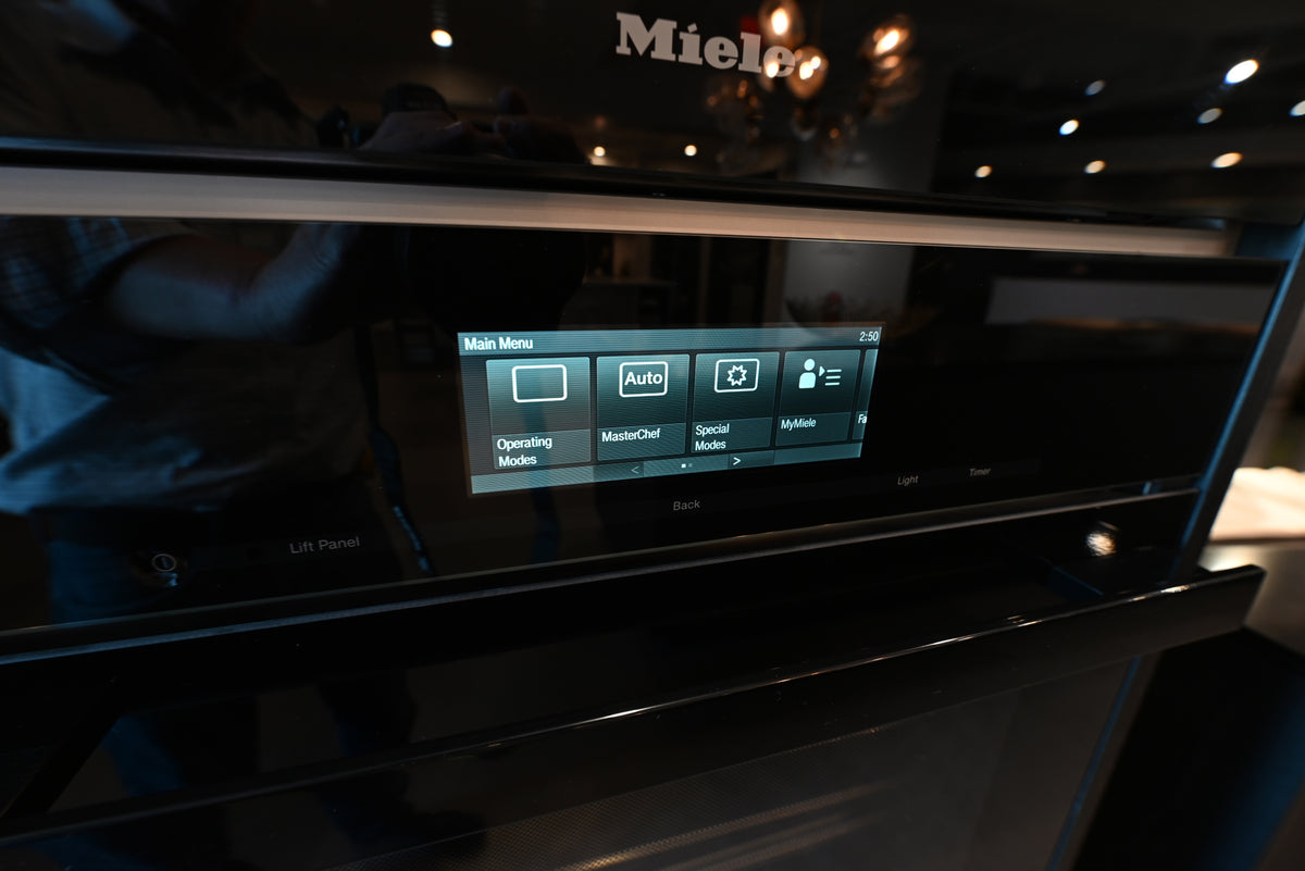 SieMatic Modern Black Kitchen with Island & Miele Appliances | photo 48