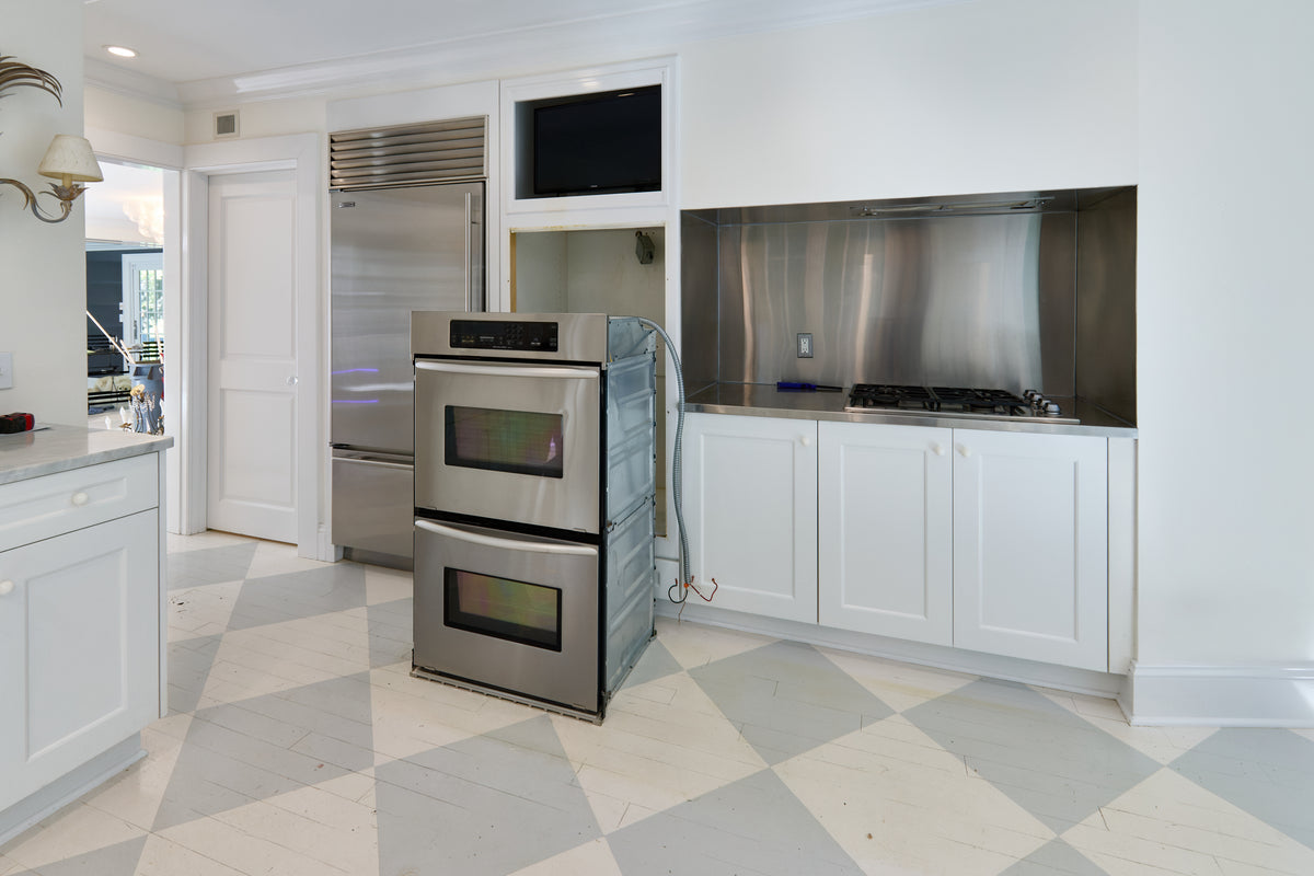 Luxury showroom display white wood kitchen cabinetry with soft close drawers