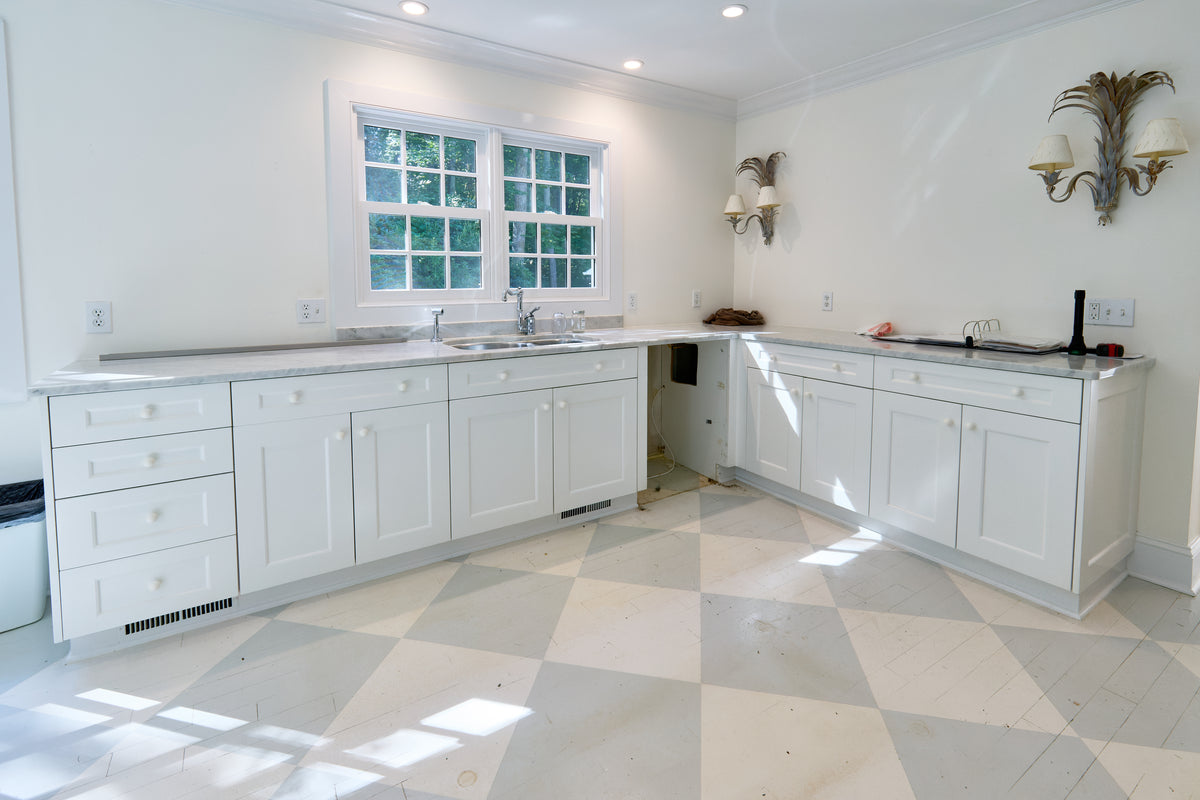 Ultracraft Peak white transitional kitchen cabinets full access frameless layout