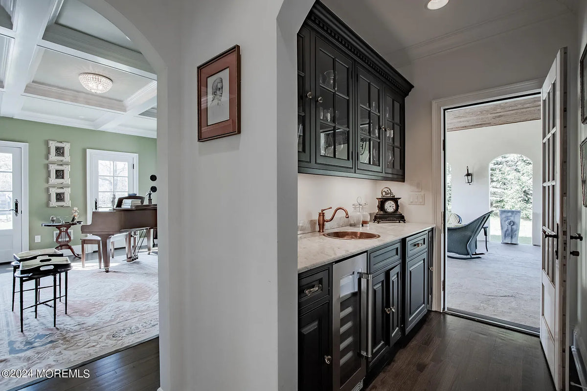 Custom Traditional Black Butler's Pantry with Marble Countertops