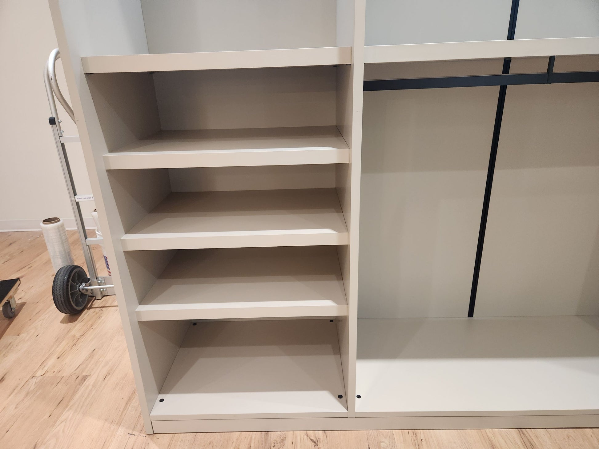 Close up of Hans Krug closet hanging bays and premium hardware finishes