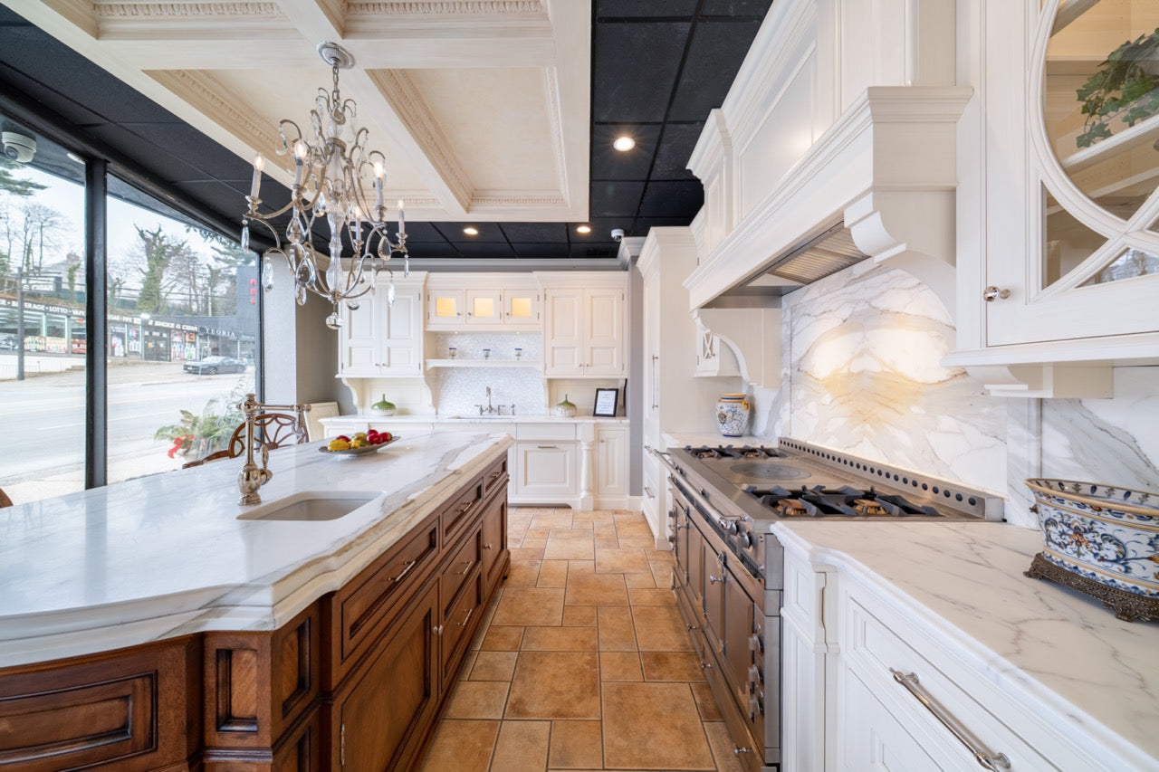 Showcase Transitional White Kitchen with Marble Countertops and La Cornue Chateau 120 Range with French Top