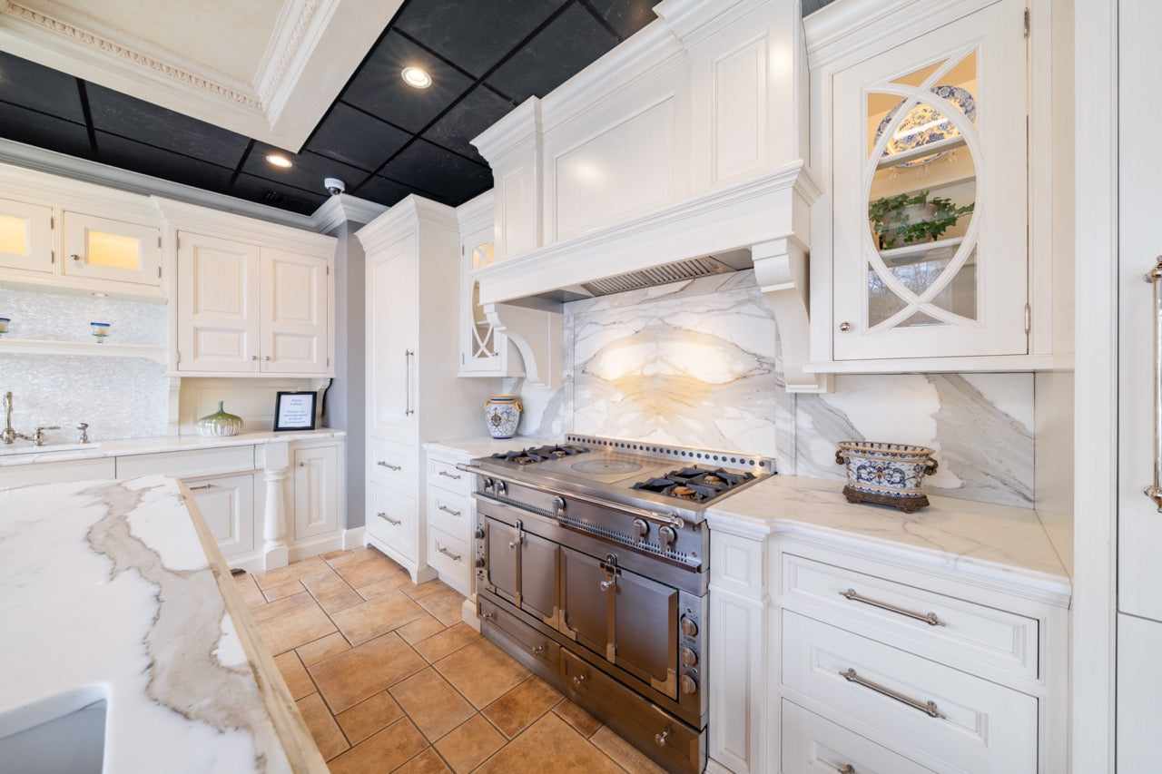 Showcase Transitional White Kitchen with Marble Countertops and La Cornue Chateau 120 Range with French Top