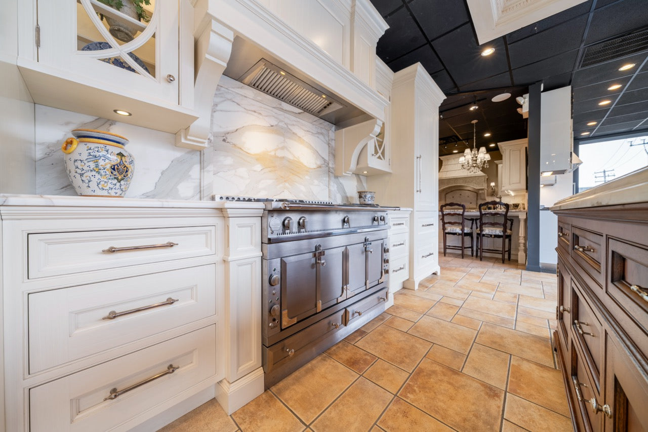 Showcase Transitional White Kitchen with Marble Countertops and La Cornue Chateau 120 Range with French Top