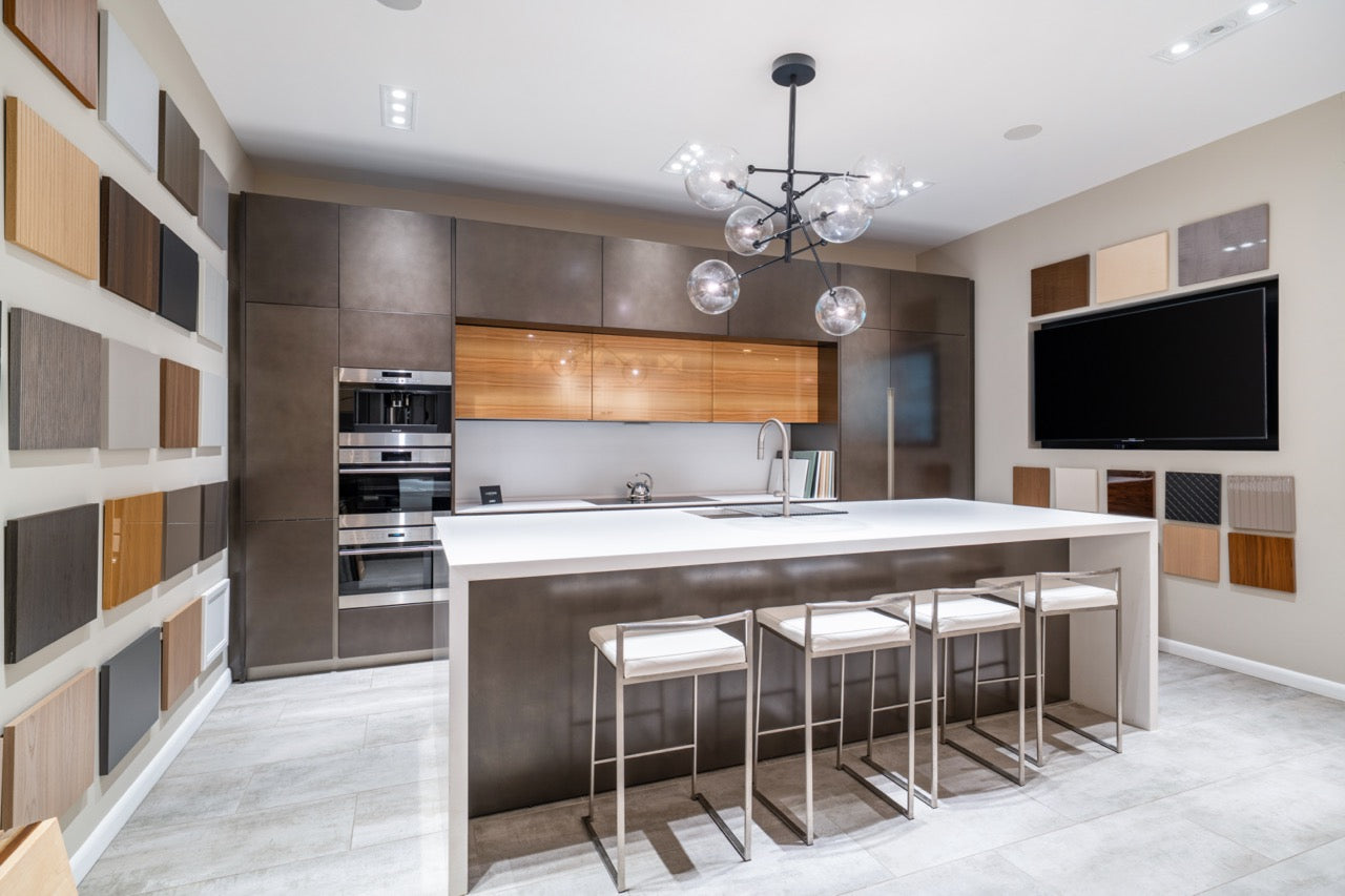 Composit Modern Brown Kitchen with Waterfall Island, Stone Countertops and Wolf & Sub-Zero Appliances