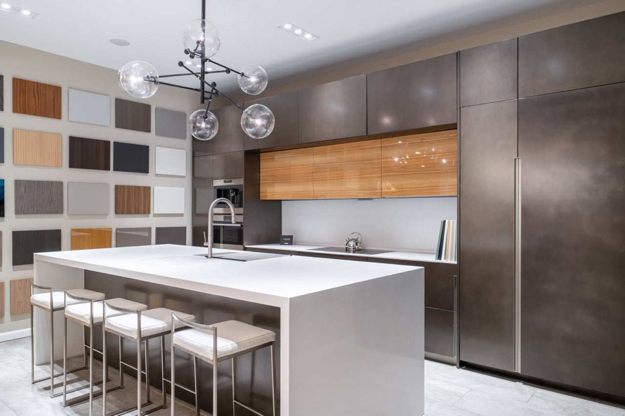 Composit Modern Brown Kitchen with Waterfall Island, Stone Countertops and Wolf & Sub-Zero Appliances