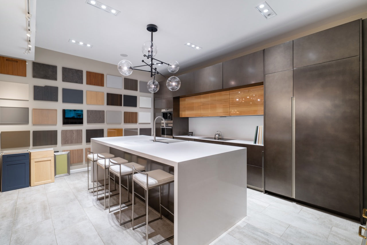 Composit Modern Brown Kitchen with Waterfall Island, Stone Countertops and Wolf & Sub-Zero Appliances