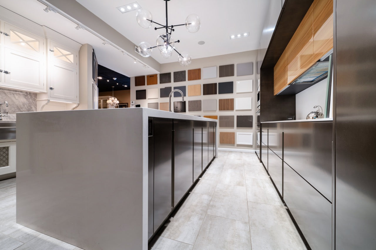 Composit Modern Brown Kitchen with Waterfall Island, Stone Countertops and Wolf & Sub-Zero Appliances