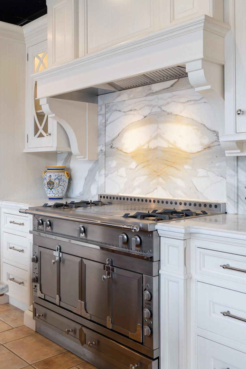 Showcase Transitional White Kitchen with Marble Countertops and La Cornue Chateau 120 Range with French Top