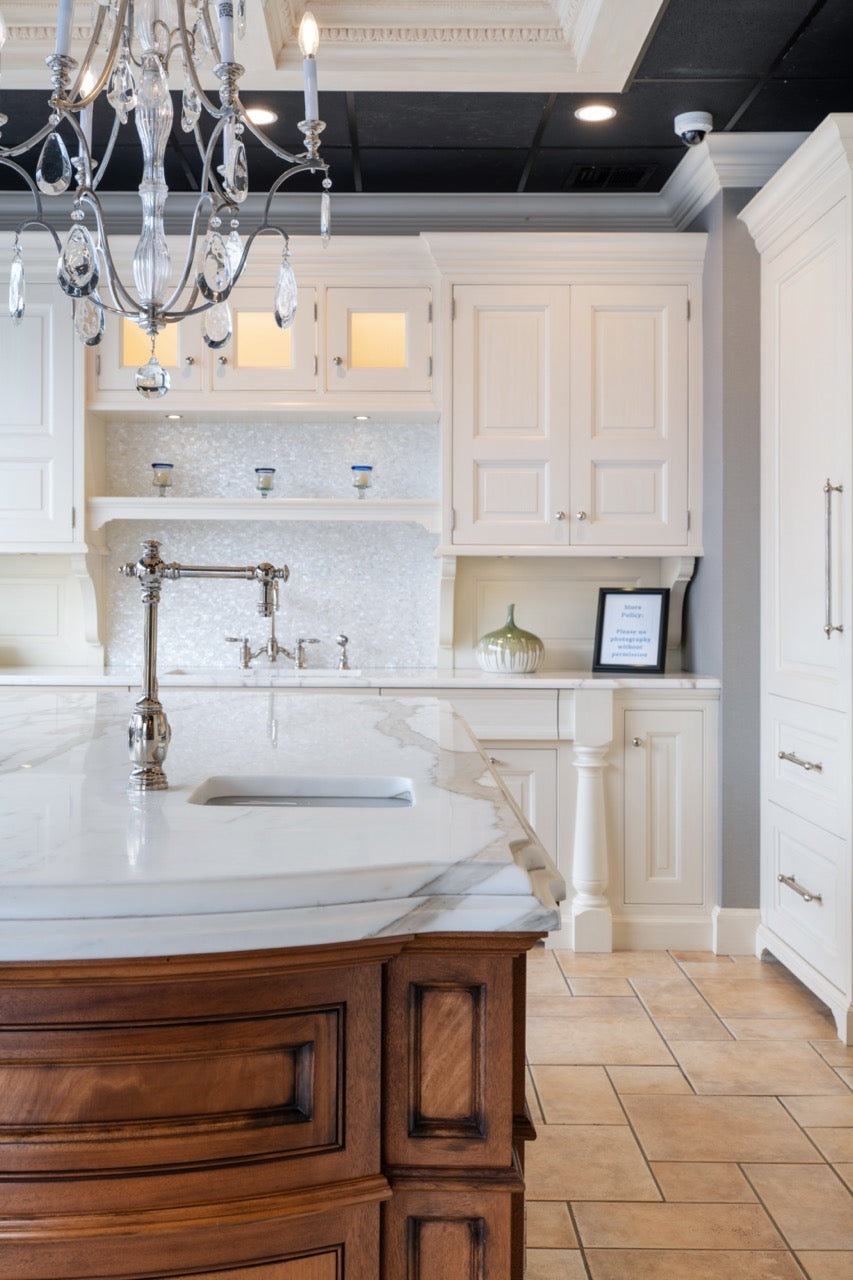 Showcase Transitional White Kitchen with Marble Countertops and La Cornue Chateau 120 Range with French Top