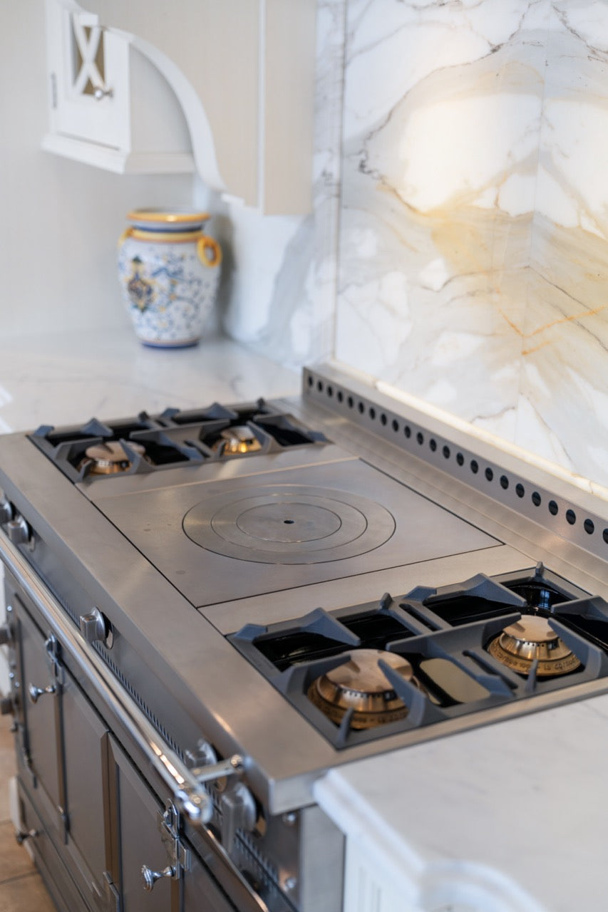 Showcase Transitional White Kitchen with Marble Countertops and La Cornue Chateau 120 Range with French Top