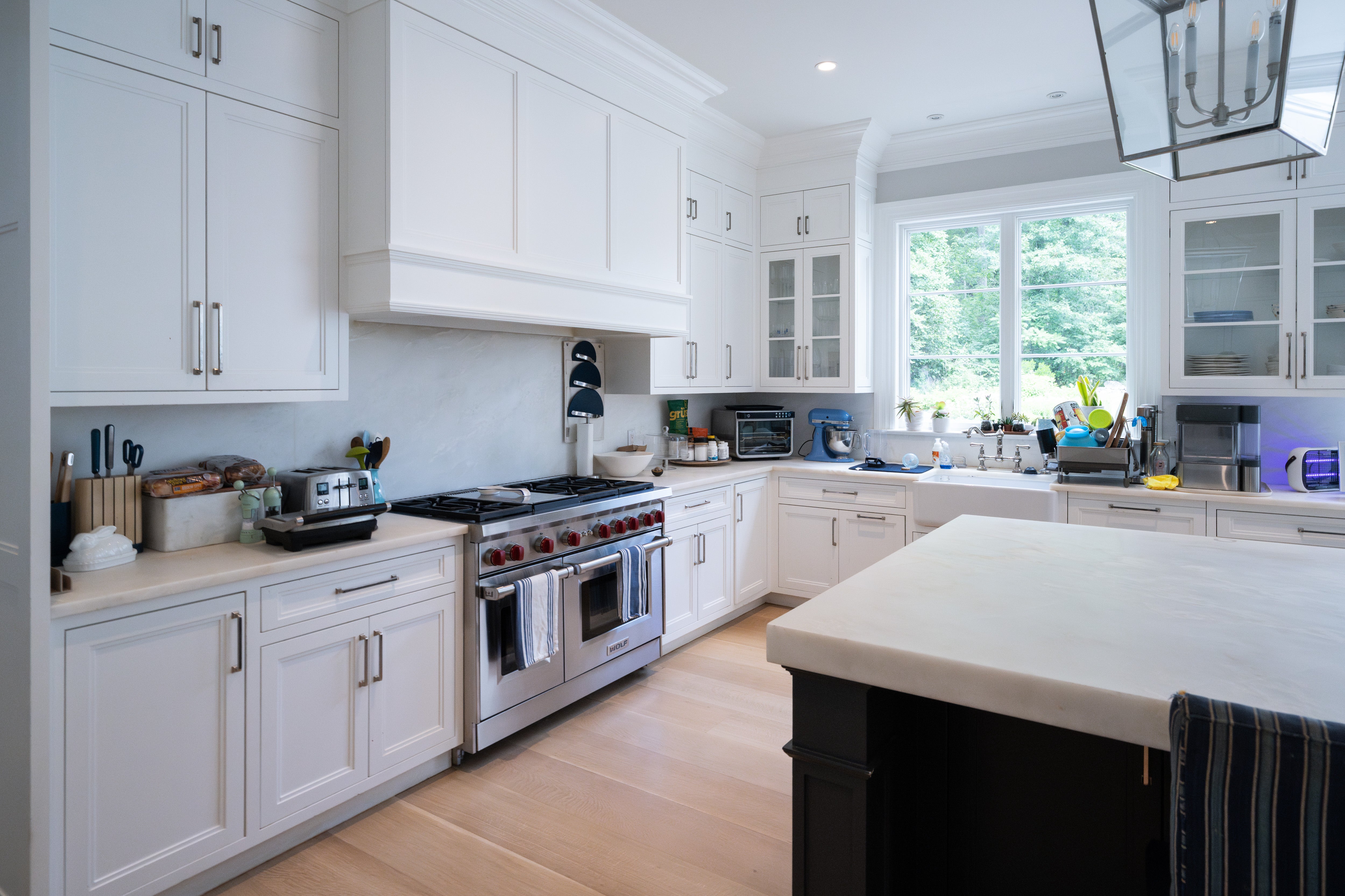 "The Abercorn" Transitional White Kitchen with Island & 48" Wolf Range