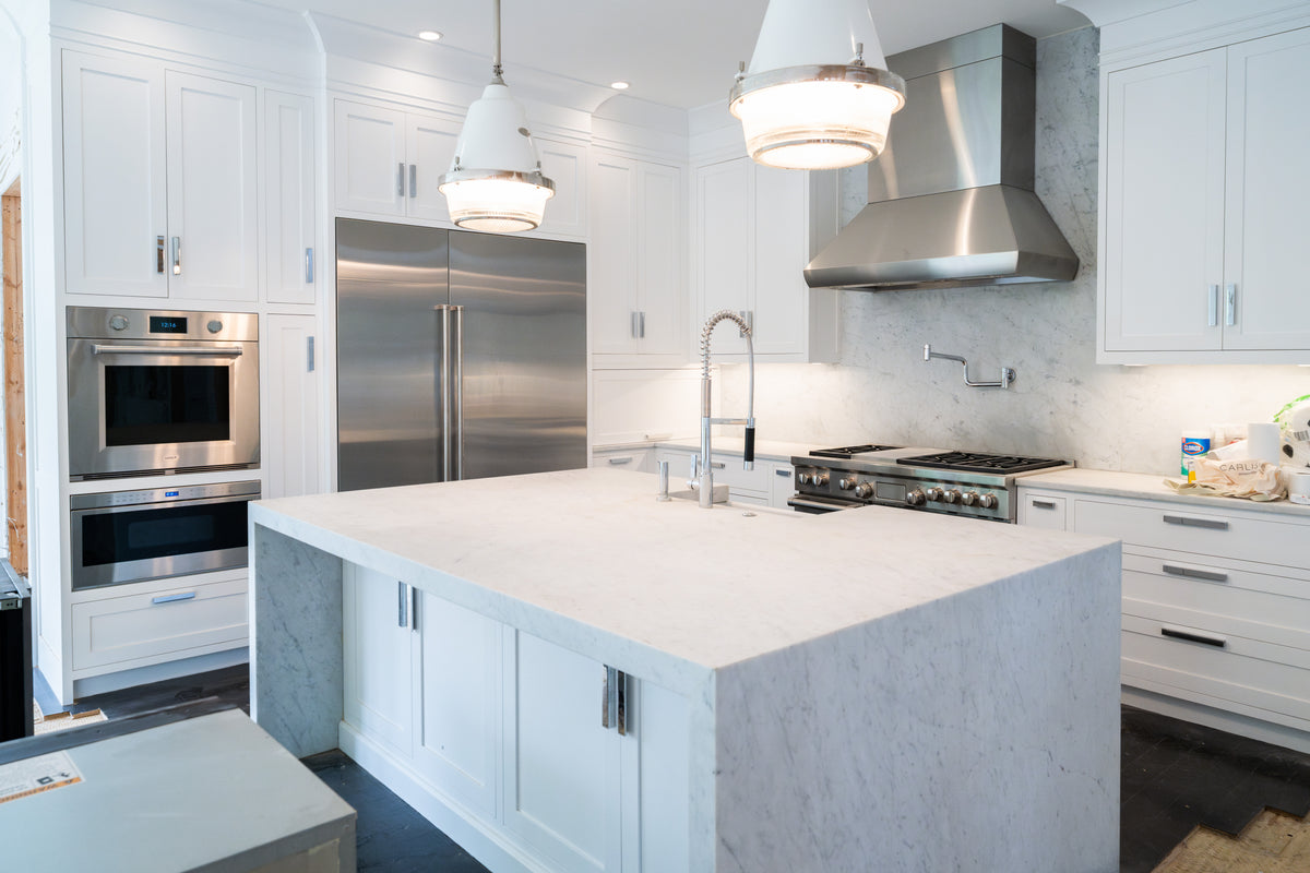 “The Pembroke” Transitional White Kitchen with Island, Wolf & Sub-Zero Appliances