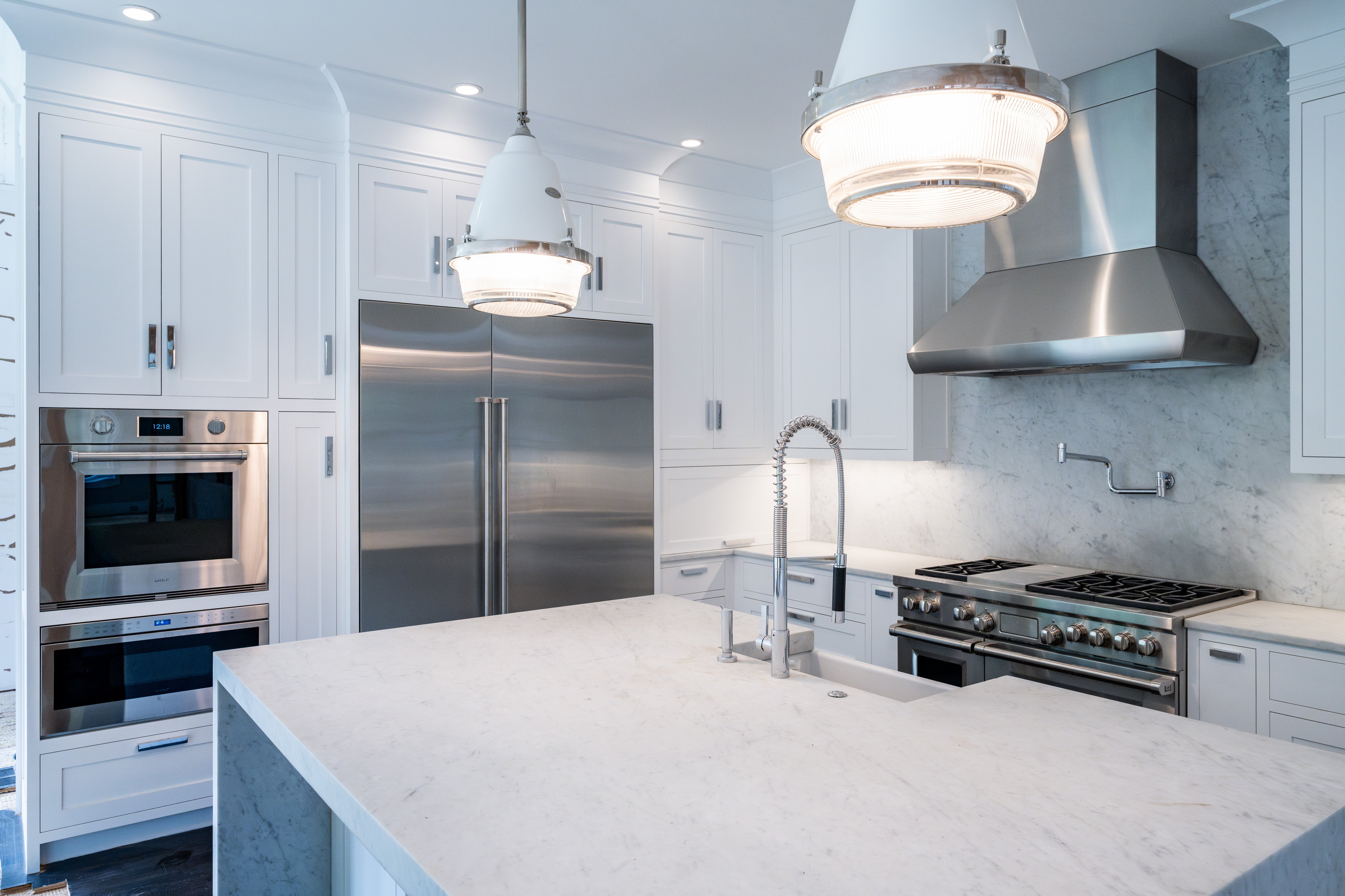 “The Pembroke” Transitional White Kitchen with Island, Wolf & Sub-Zero Appliances
