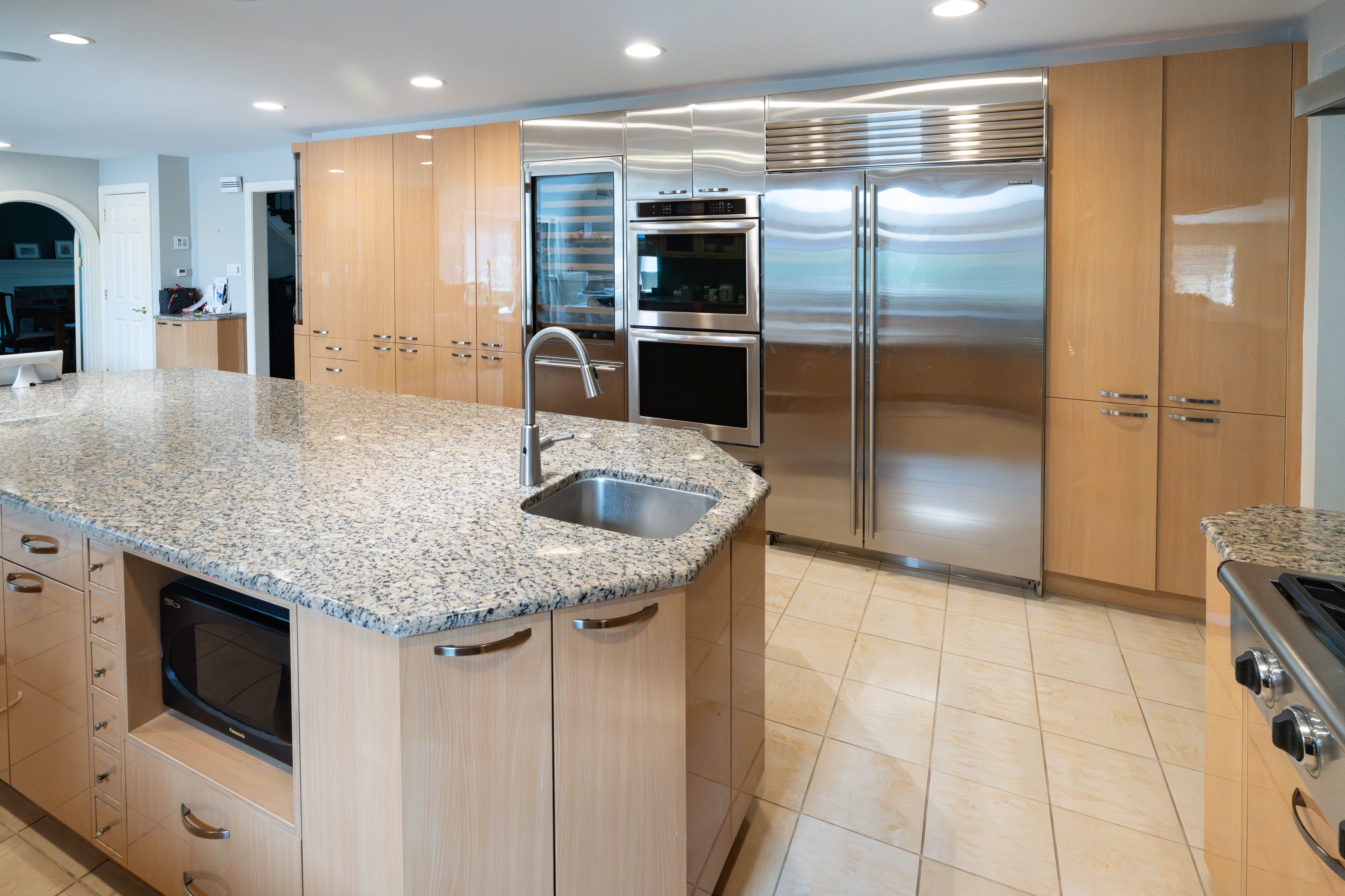 Contemporary minimalist light wood finish luxury showroom kitchen display