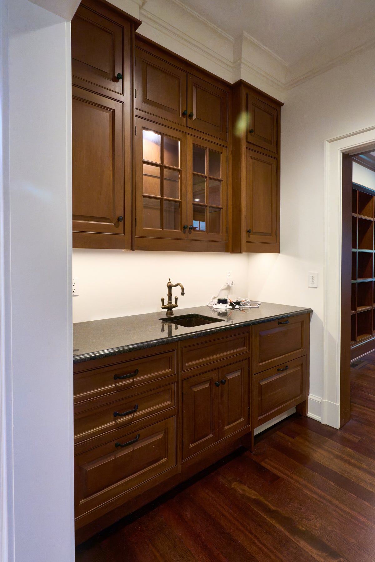 Luxury  custom wood kitchen and entertaining cabinetry
