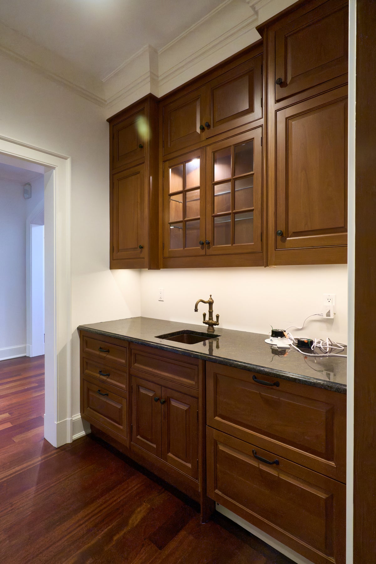 High-end architectural natural wood beverage station with integrated refrigeration