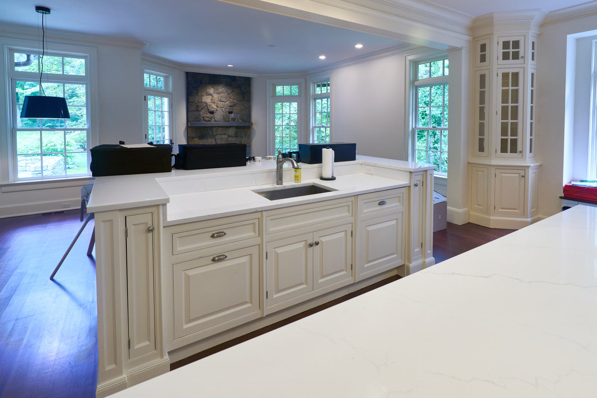 High-end architectural white kitchen suite with professional Wolf gas range
