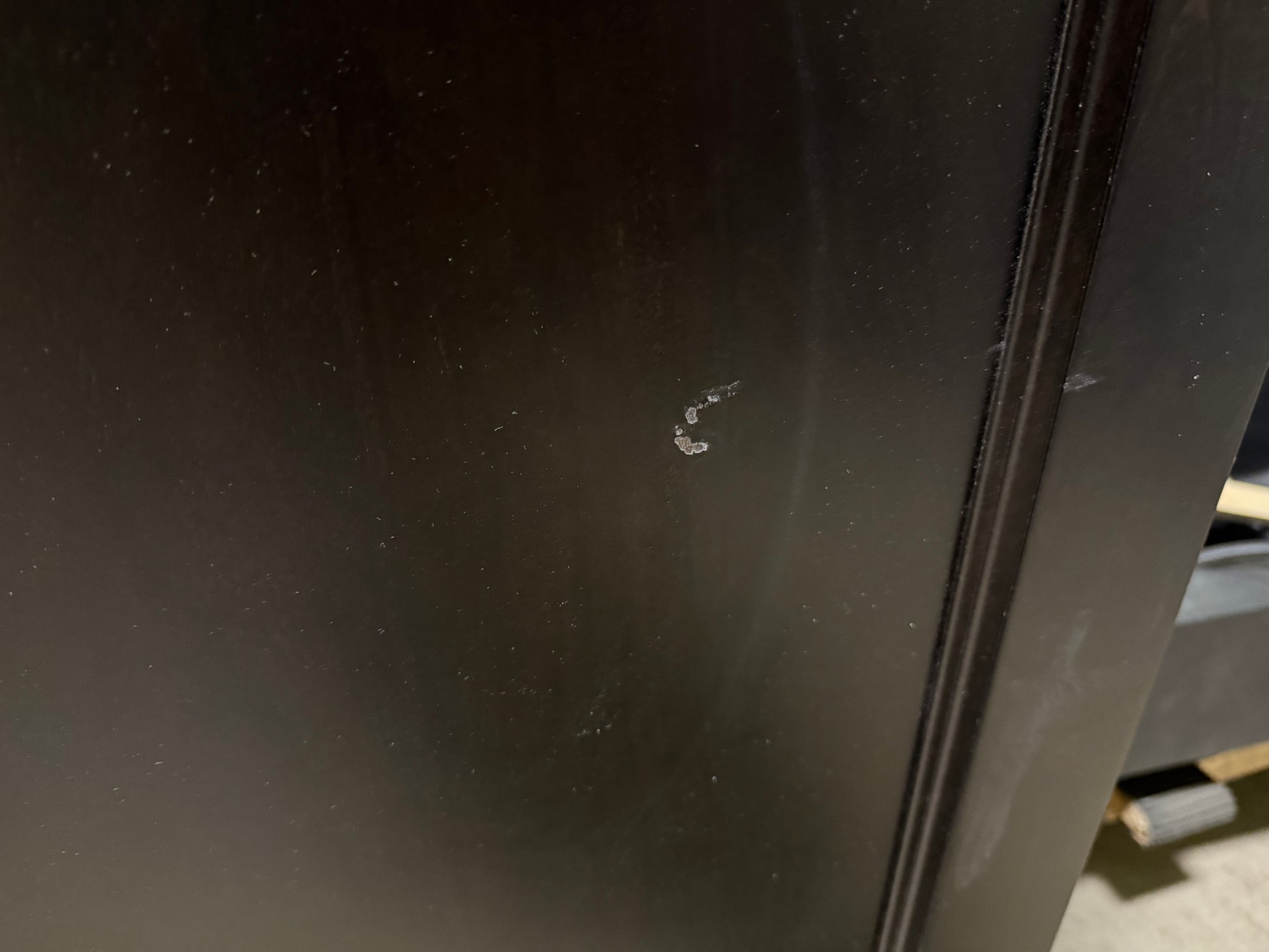 Scratch on a black surface