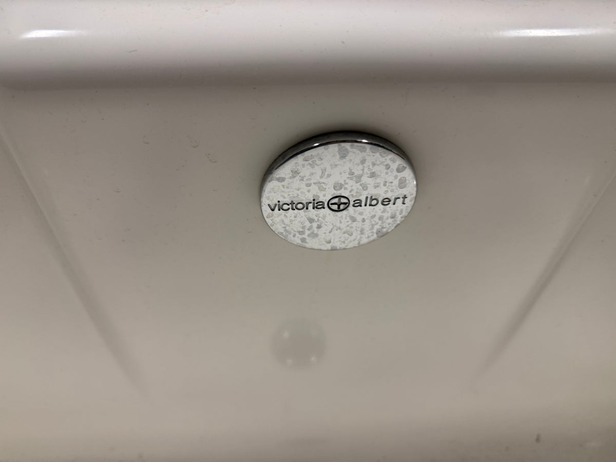 High-end residential bathroom soaking tub with clean sculptural silhouette