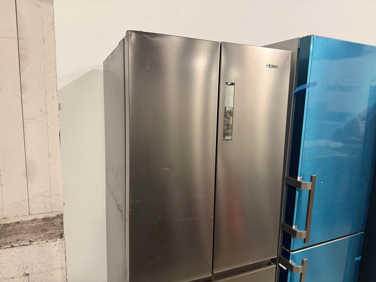 Compact residential kitchen refrigerator with dual freezer drawers and recessed handles