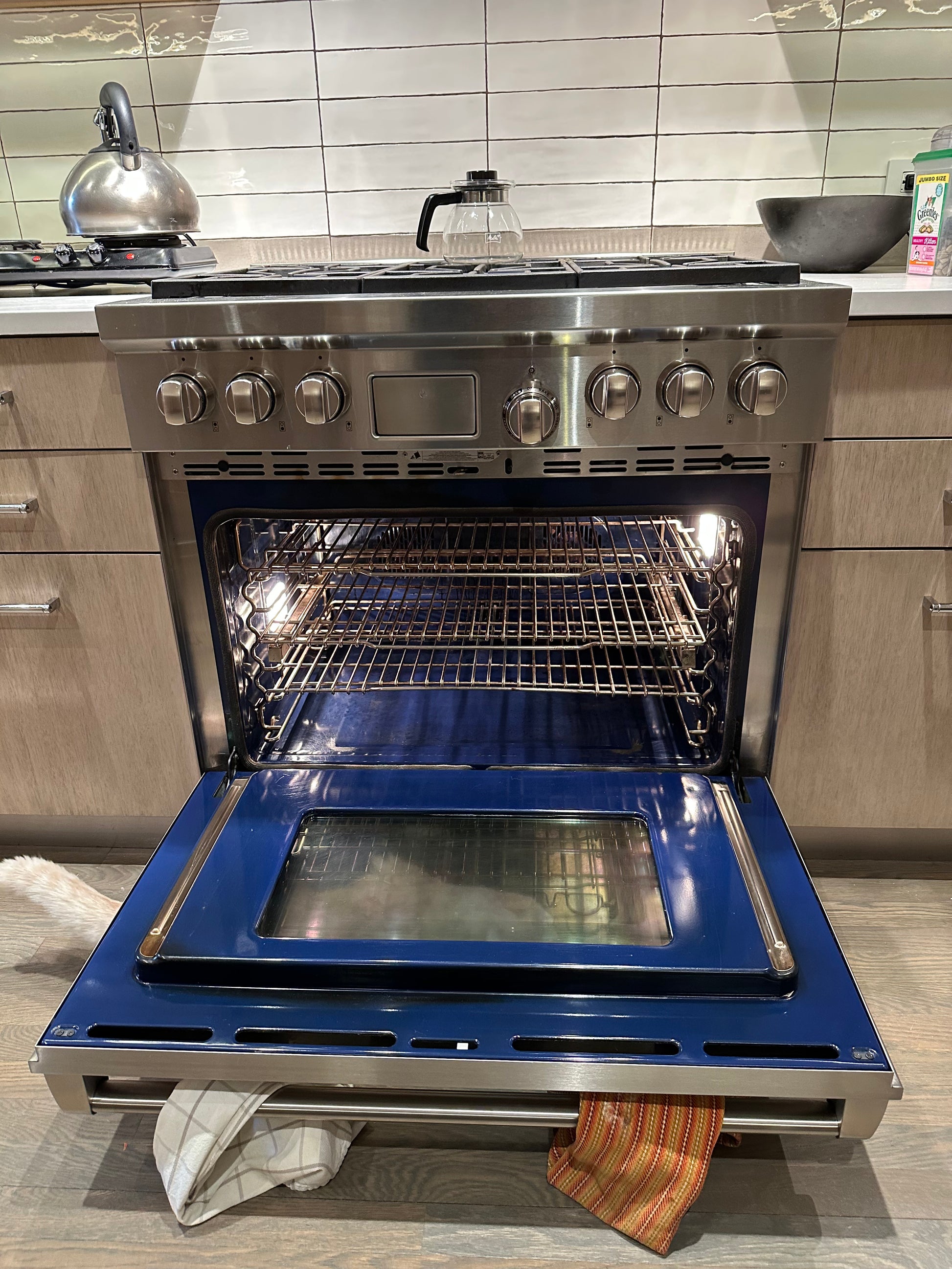 Wolf 36 inch professional gas range with six burners and stainless steel knobs