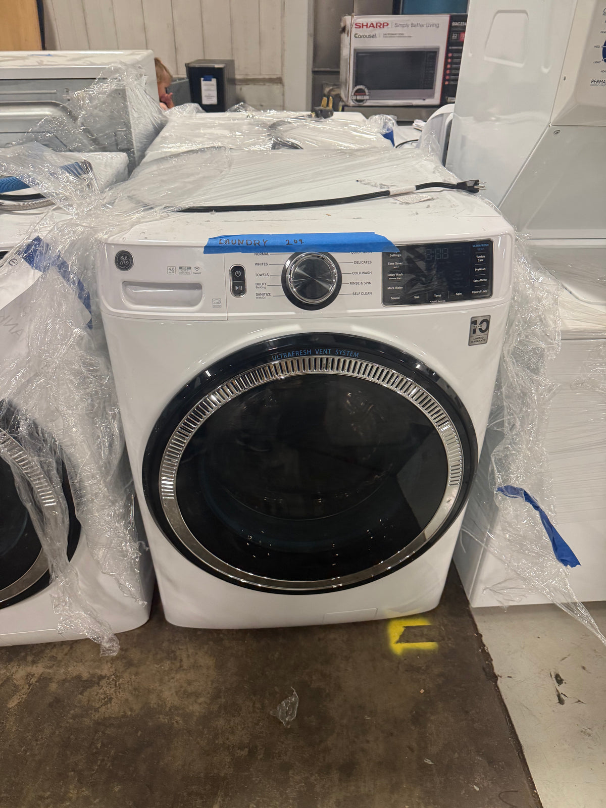 GE GFW550SSNWW 28" White Front Load Washer