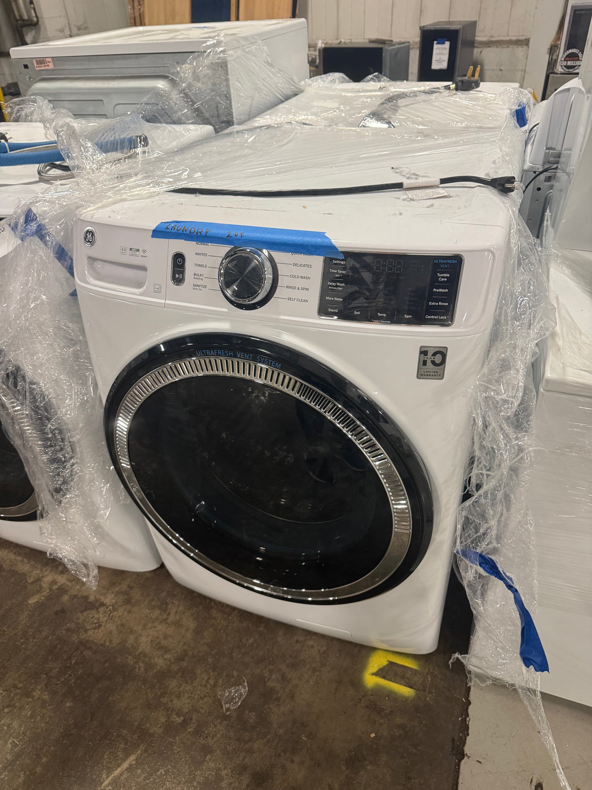 GE GFW550SSNWW 28" White Front Load Washer