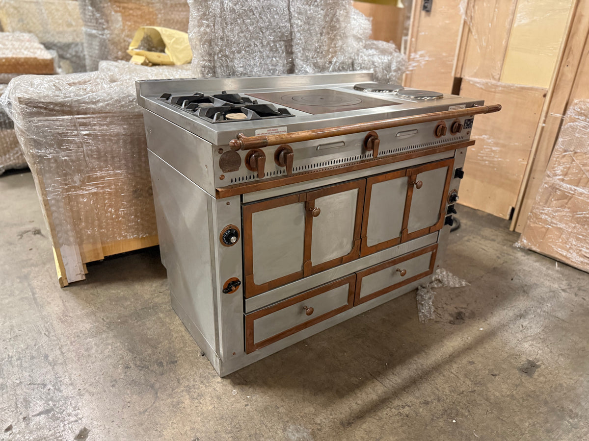 Handcrafted French luxury dual fuel range La Cornue Chateau 120 copper accents