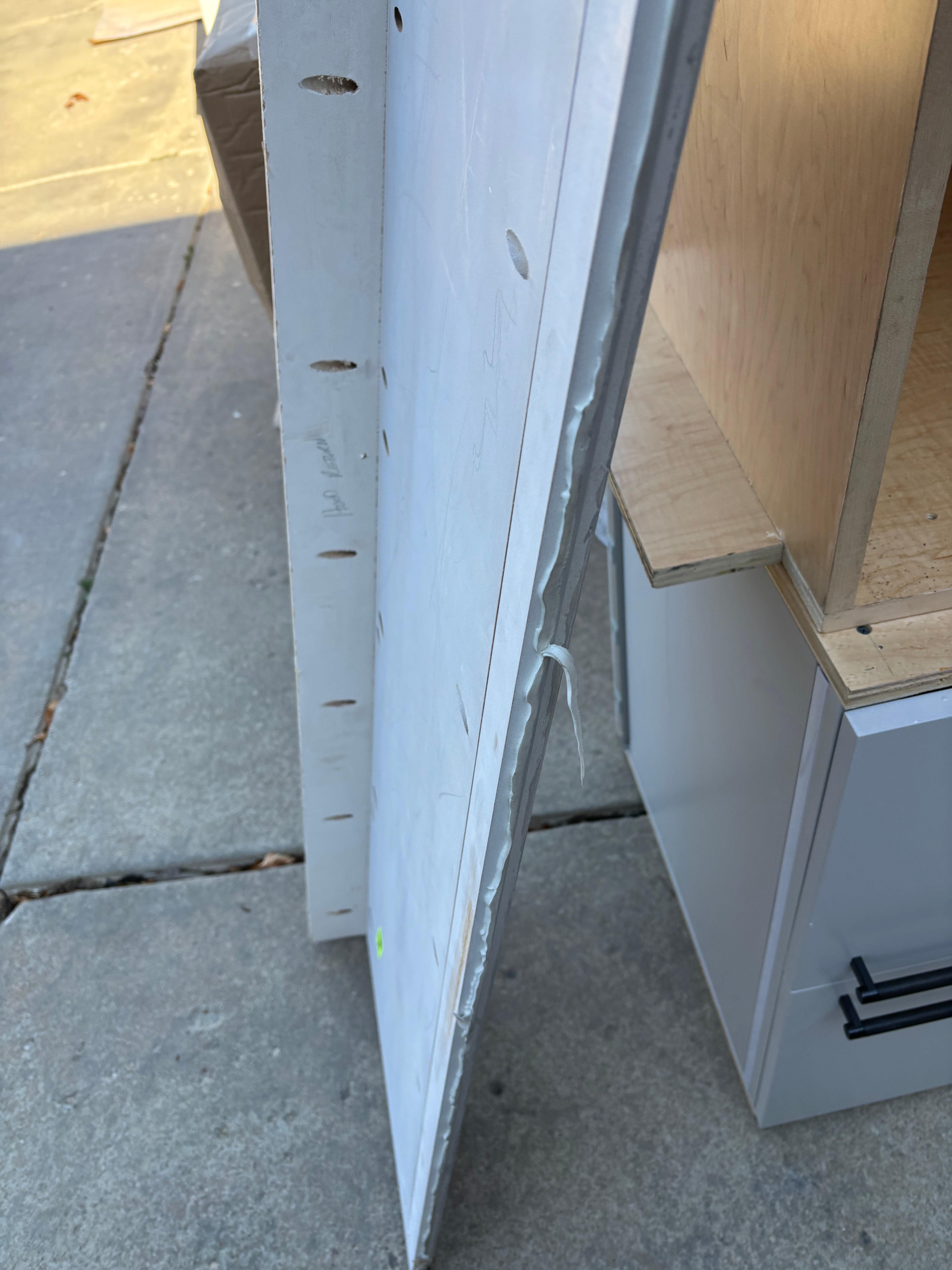 Custom Modern Light Grey Pantry with White Stone Countertops and Stainless Steel Sink