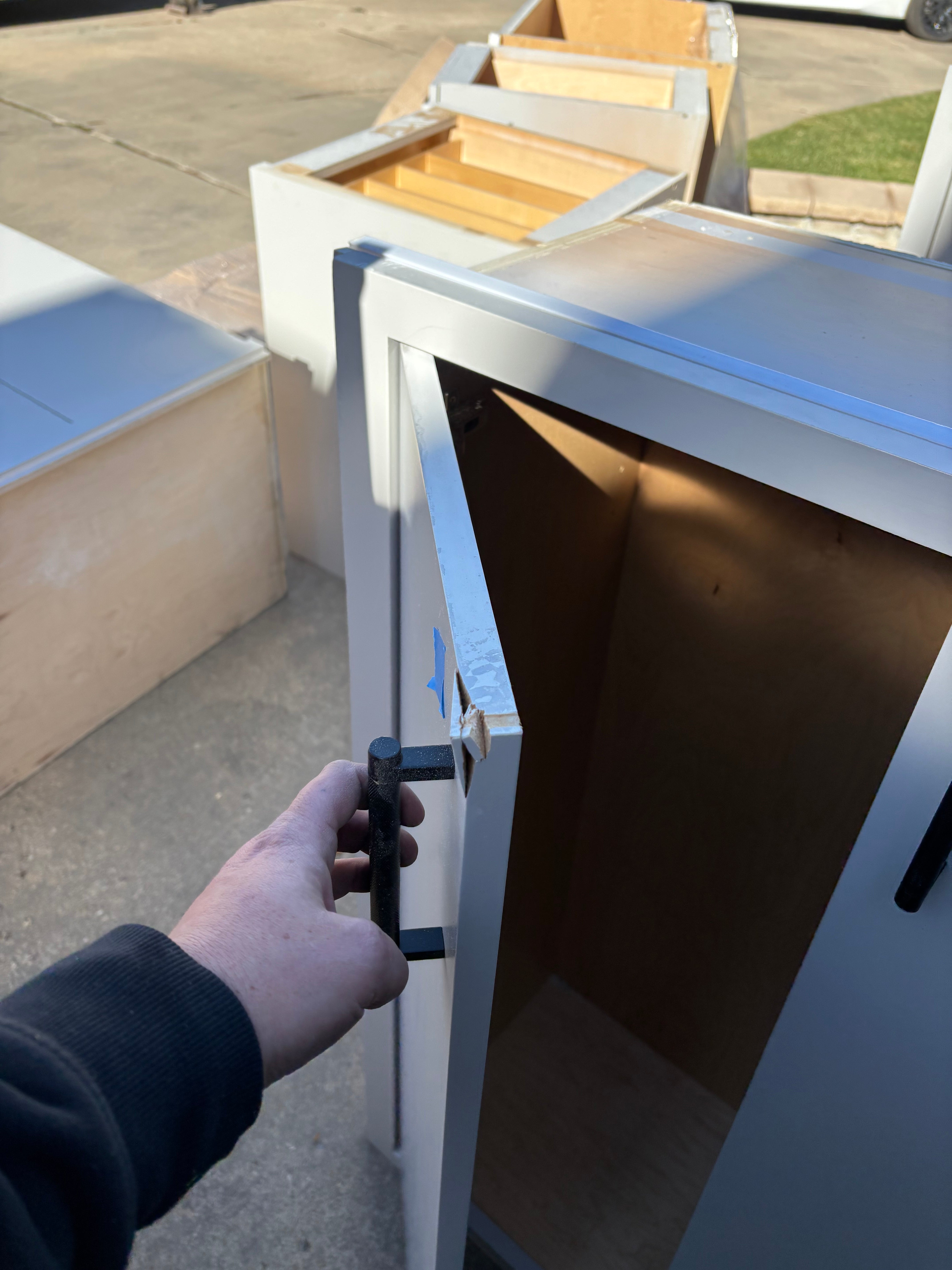 Custom Modern Light Grey Pantry with White Stone Countertops and Stainless Steel Sink