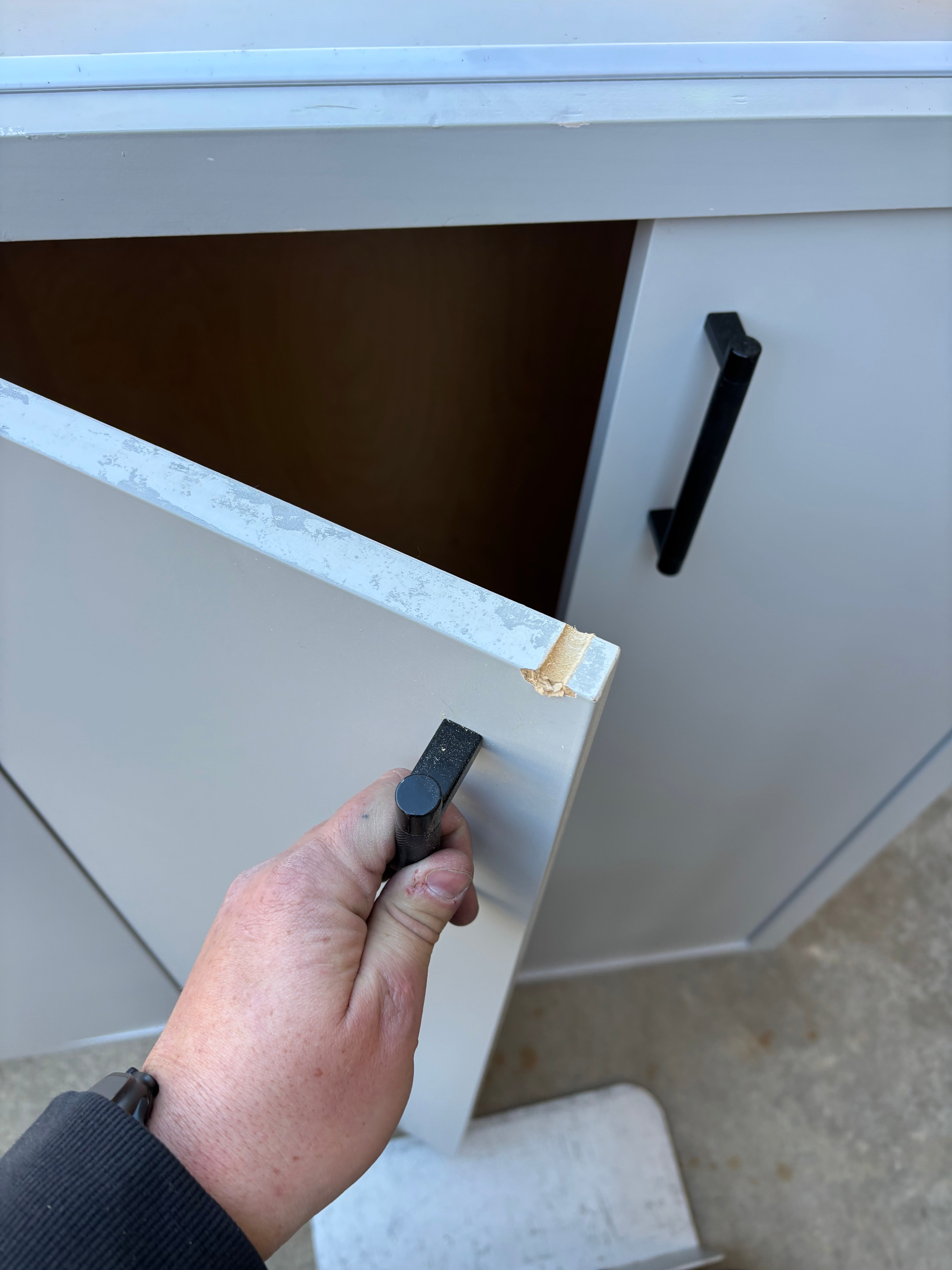 Custom Modern Light Grey Pantry with White Stone Countertops and Stainless Steel Sink