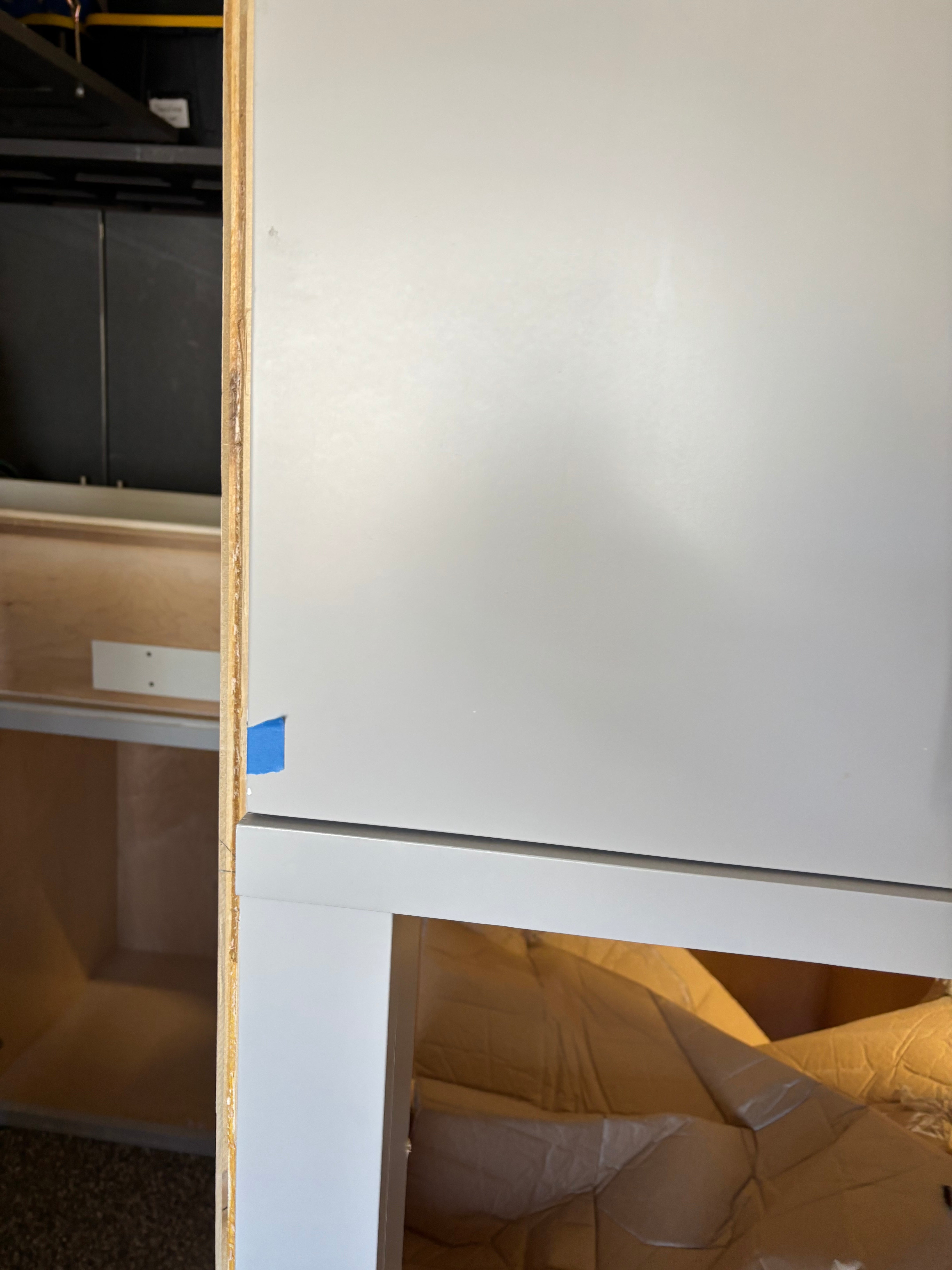 Custom Modern Light Grey Pantry with White Stone Countertops and Stainless Steel Sink