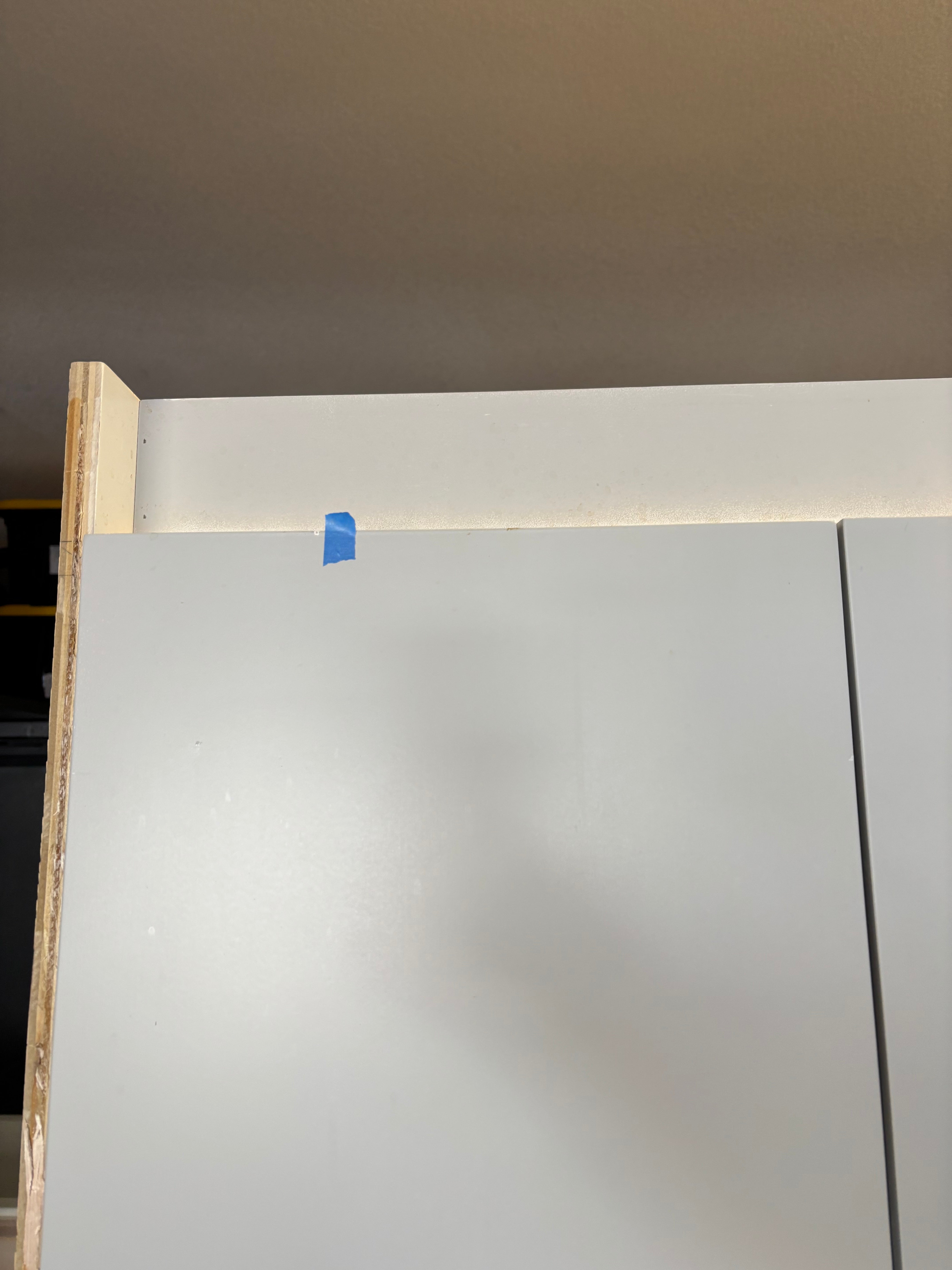 Custom Modern Light Grey Pantry with White Stone Countertops and Stainless Steel Sink