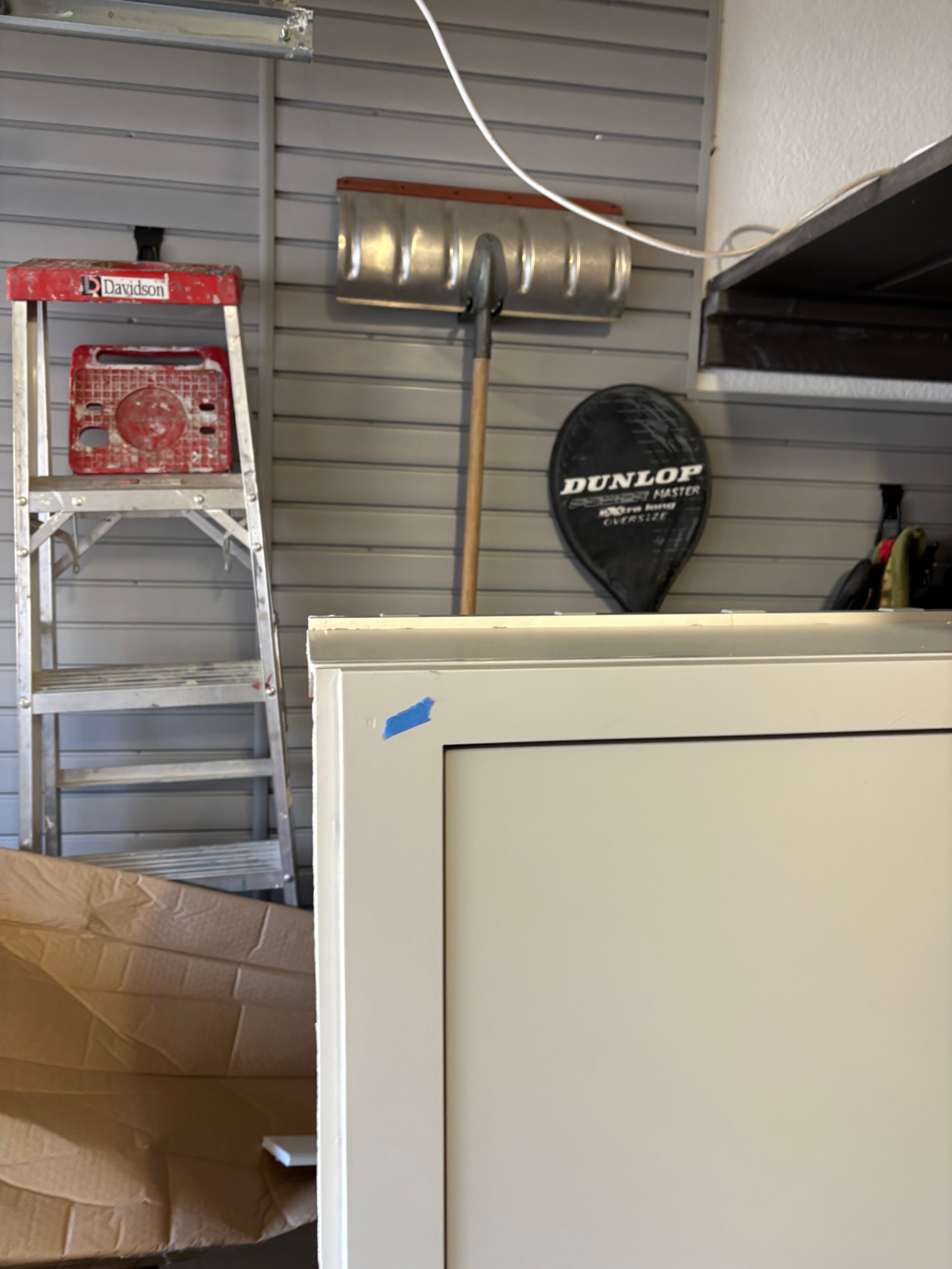 Custom Modern Light Grey Pantry with White Stone Countertops and Stainless Steel Sink