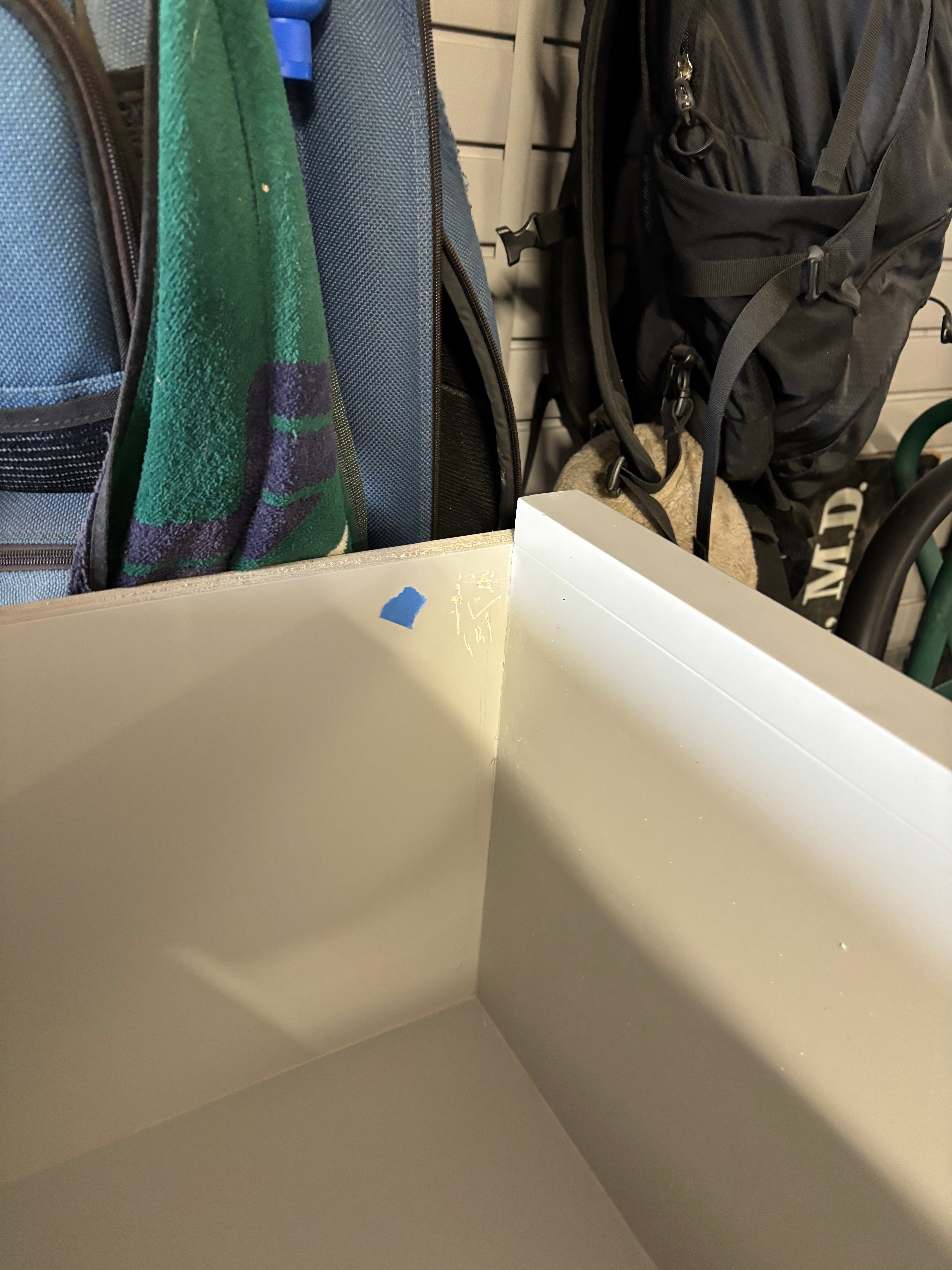 Custom Modern Light Grey Pantry with White Stone Countertops and Stainless Steel Sink