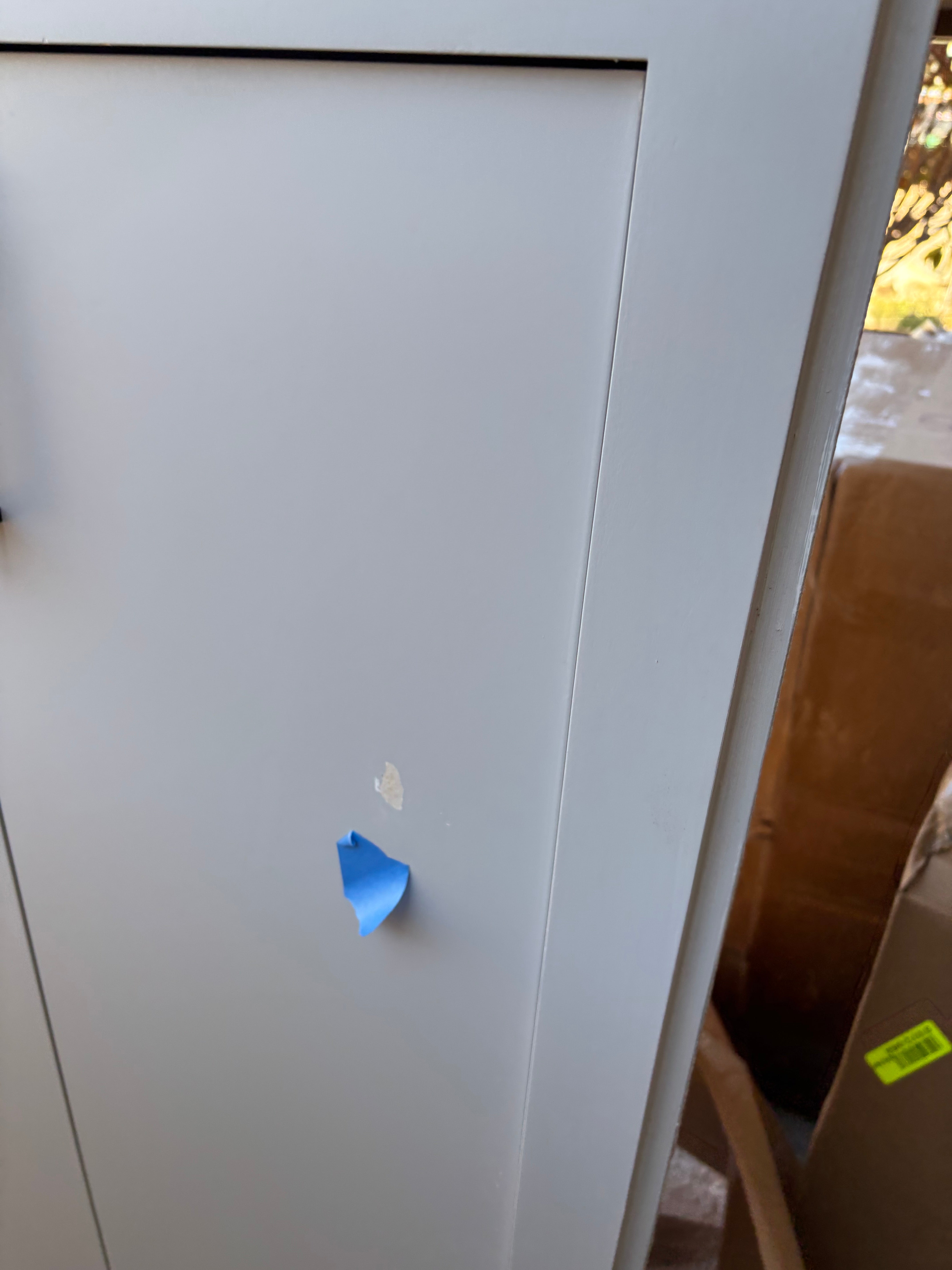 Custom Modern Light Grey Pantry with White Stone Countertops and Stainless Steel Sink