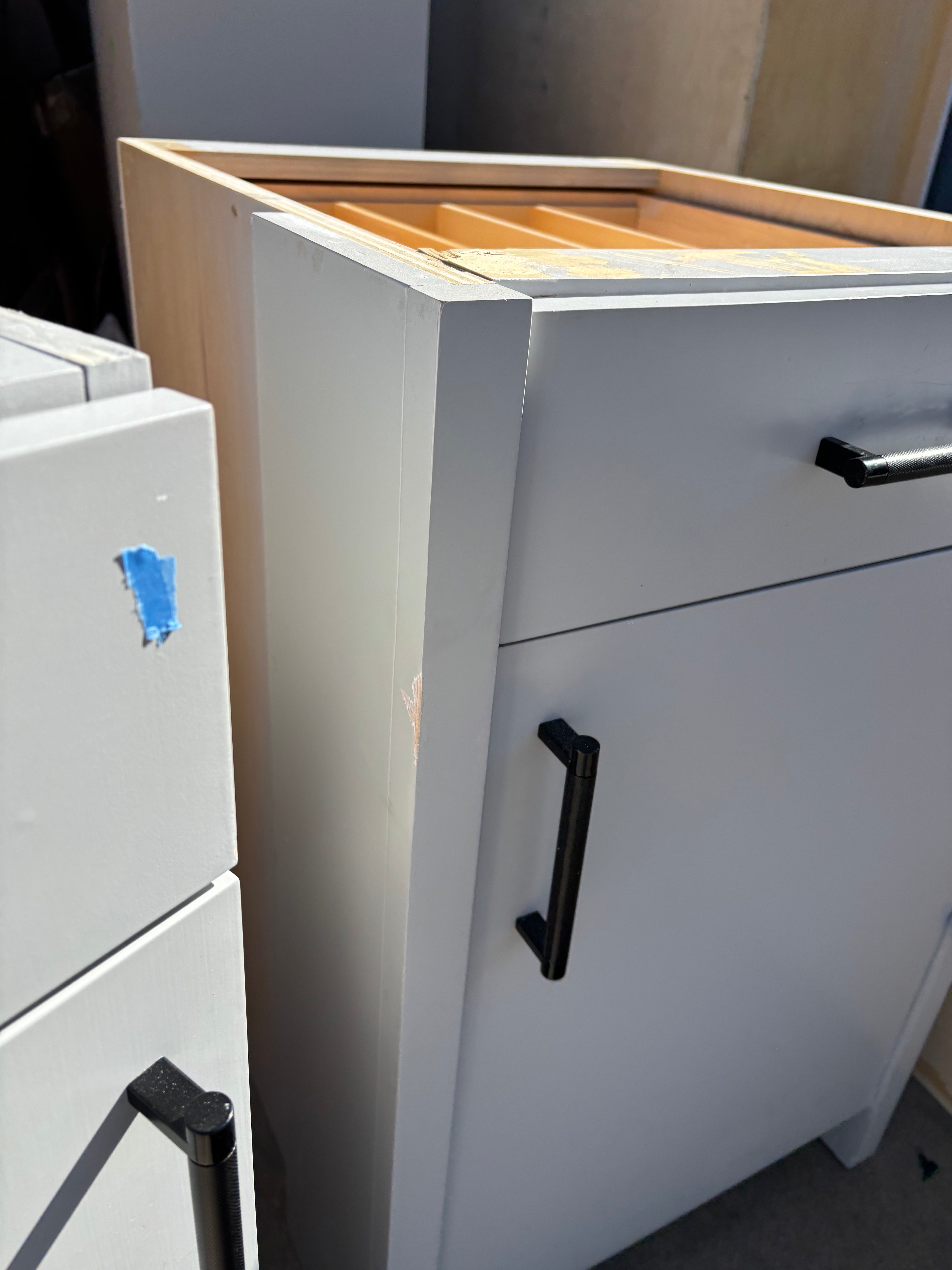 Custom Modern Light Grey Pantry with White Stone Countertops and Stainless Steel Sink