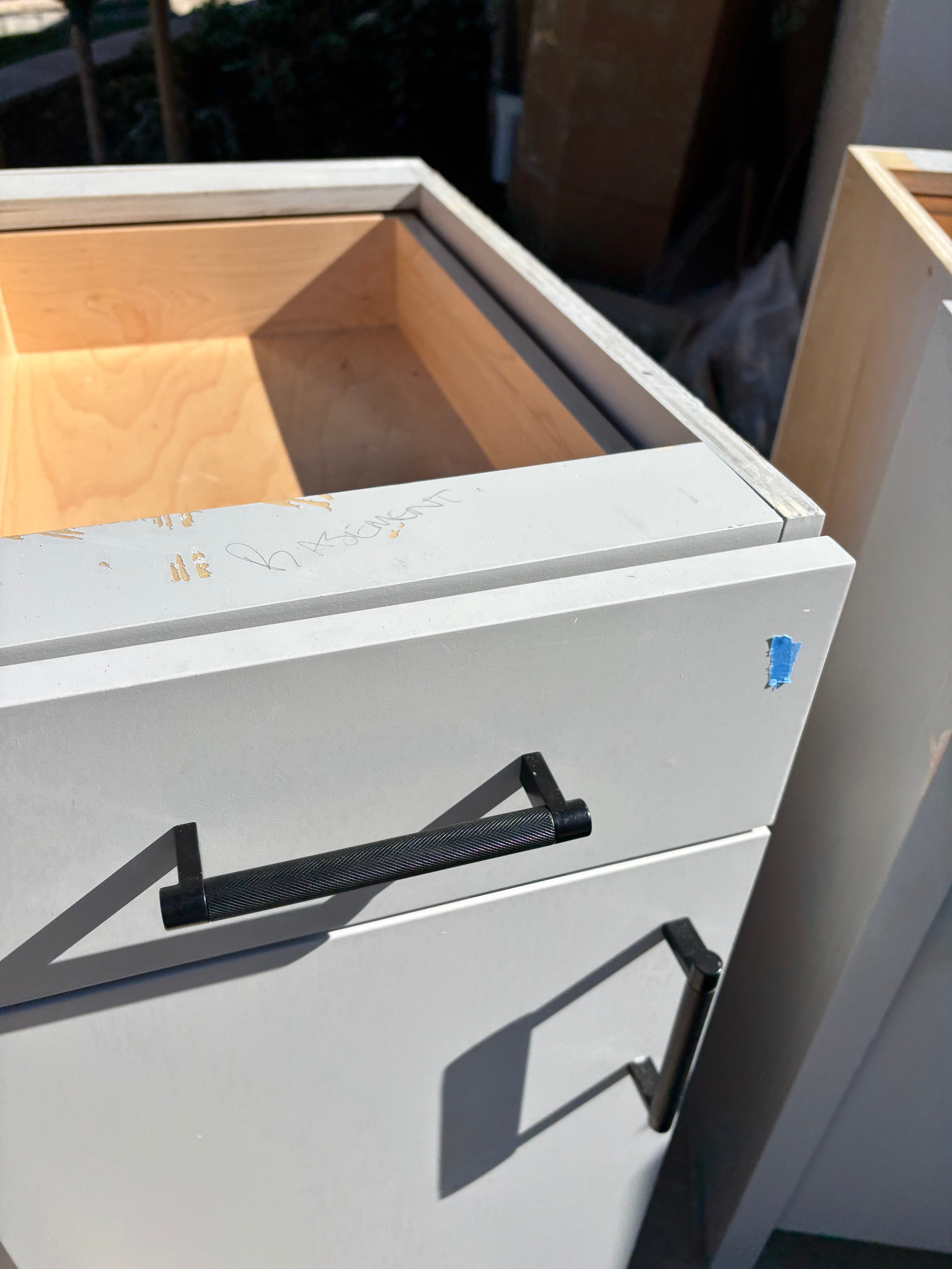 Custom Modern Light Grey Pantry with White Stone Countertops and Stainless Steel Sink