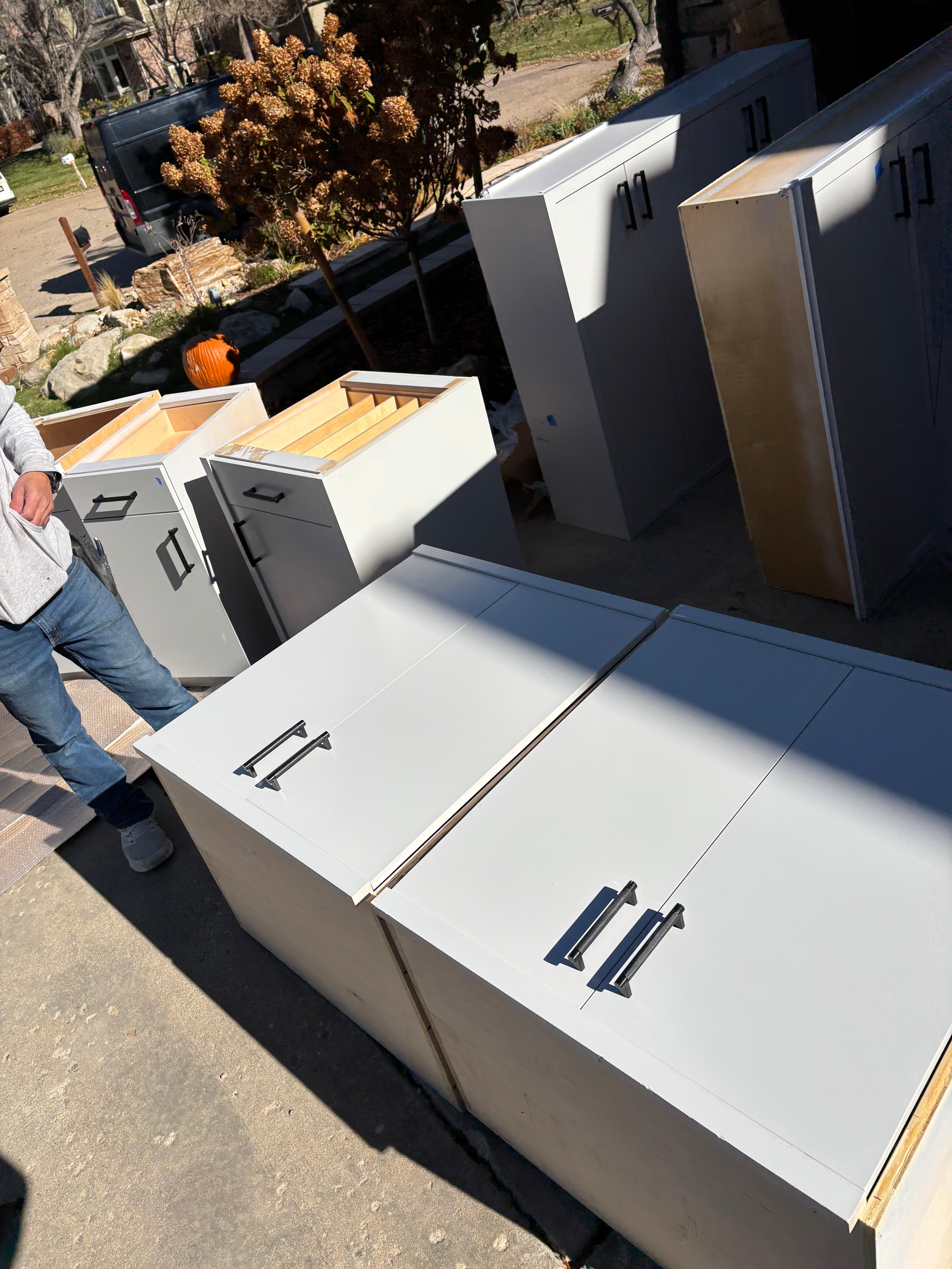 Custom Modern Light Grey Pantry with White Stone Countertops and Stainless Steel Sink