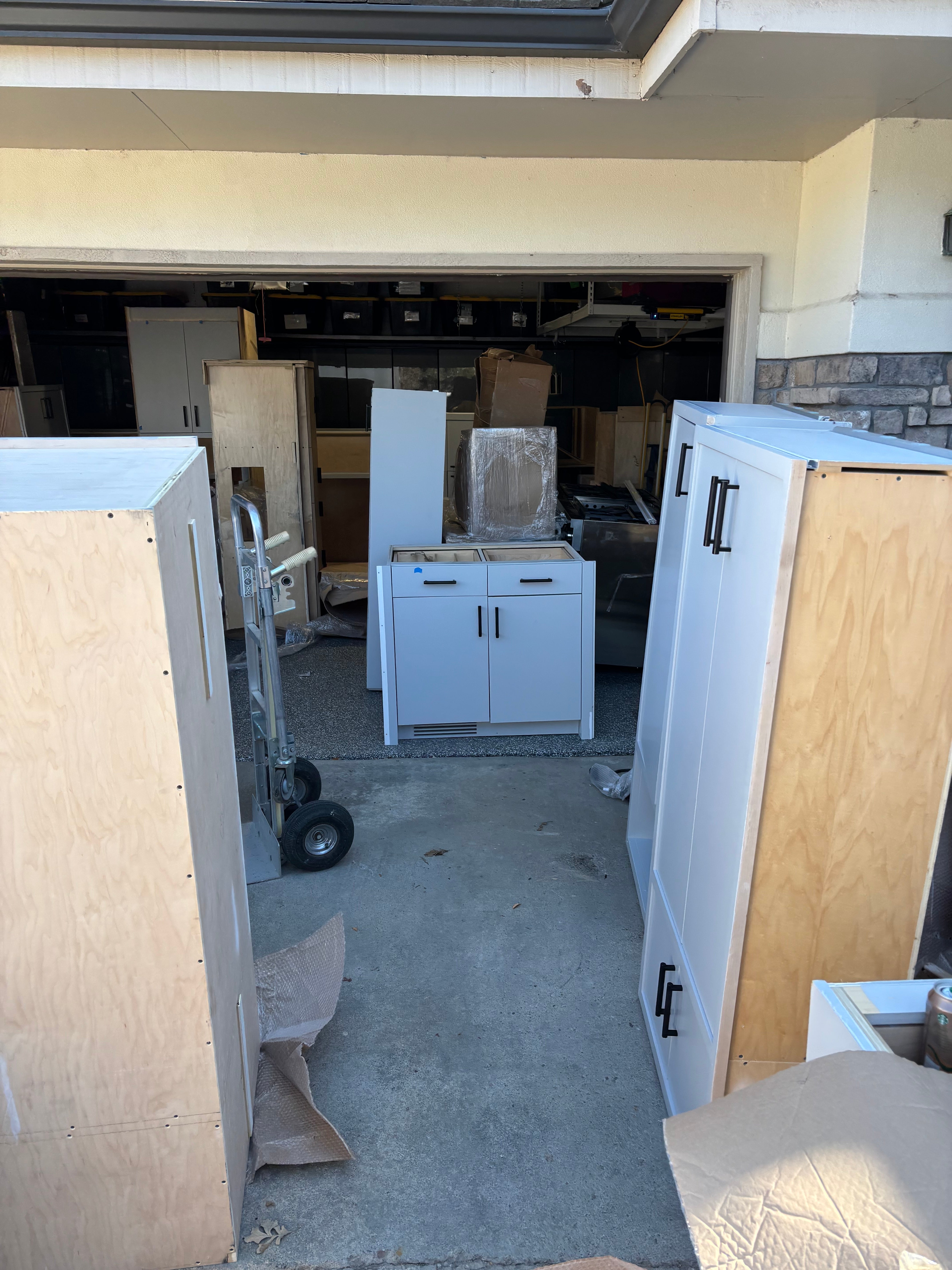 Custom Modern Light Grey Pantry with White Stone Countertops and Stainless Steel Sink