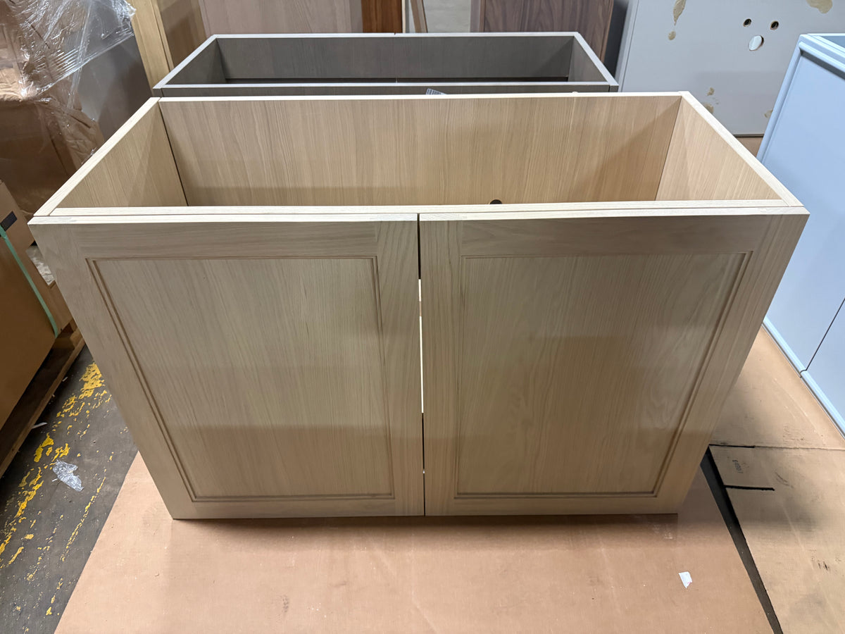 Close up view of the pale white oak wood grain finish and soft close drawer pull detail on the DOCA 47 inch vanity