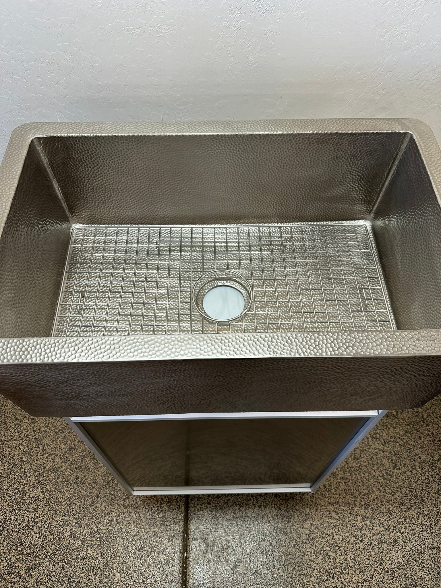 Wide interior view of 30-inch Native Trails sink with protective stainless steel bottom grid.