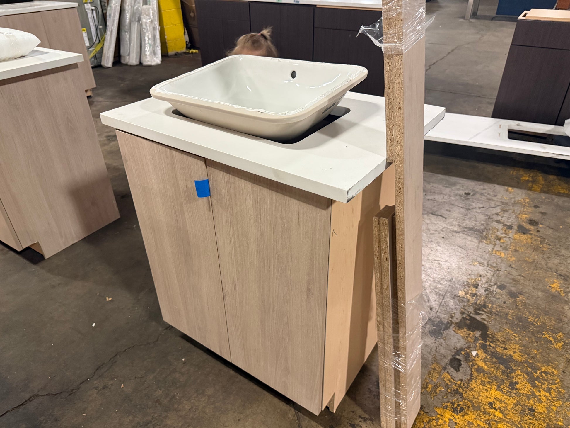 Custom transitional single bathroom vanity with organic wood texture by Cabico