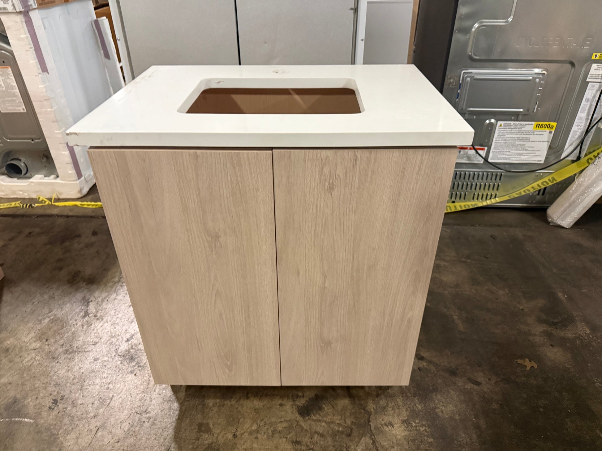 Cabico 30 inch sandy oak wood grain laminate single vanity cabinet