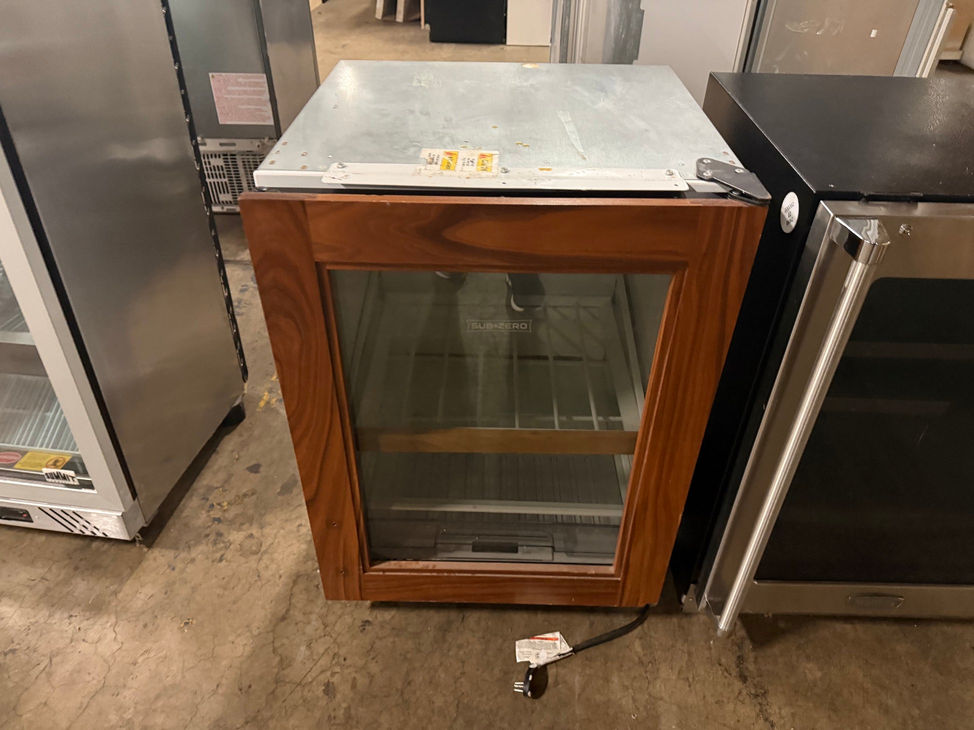 Sub-Zero 24 inch panel-ready undercounter glass door beverage center UC24BGO