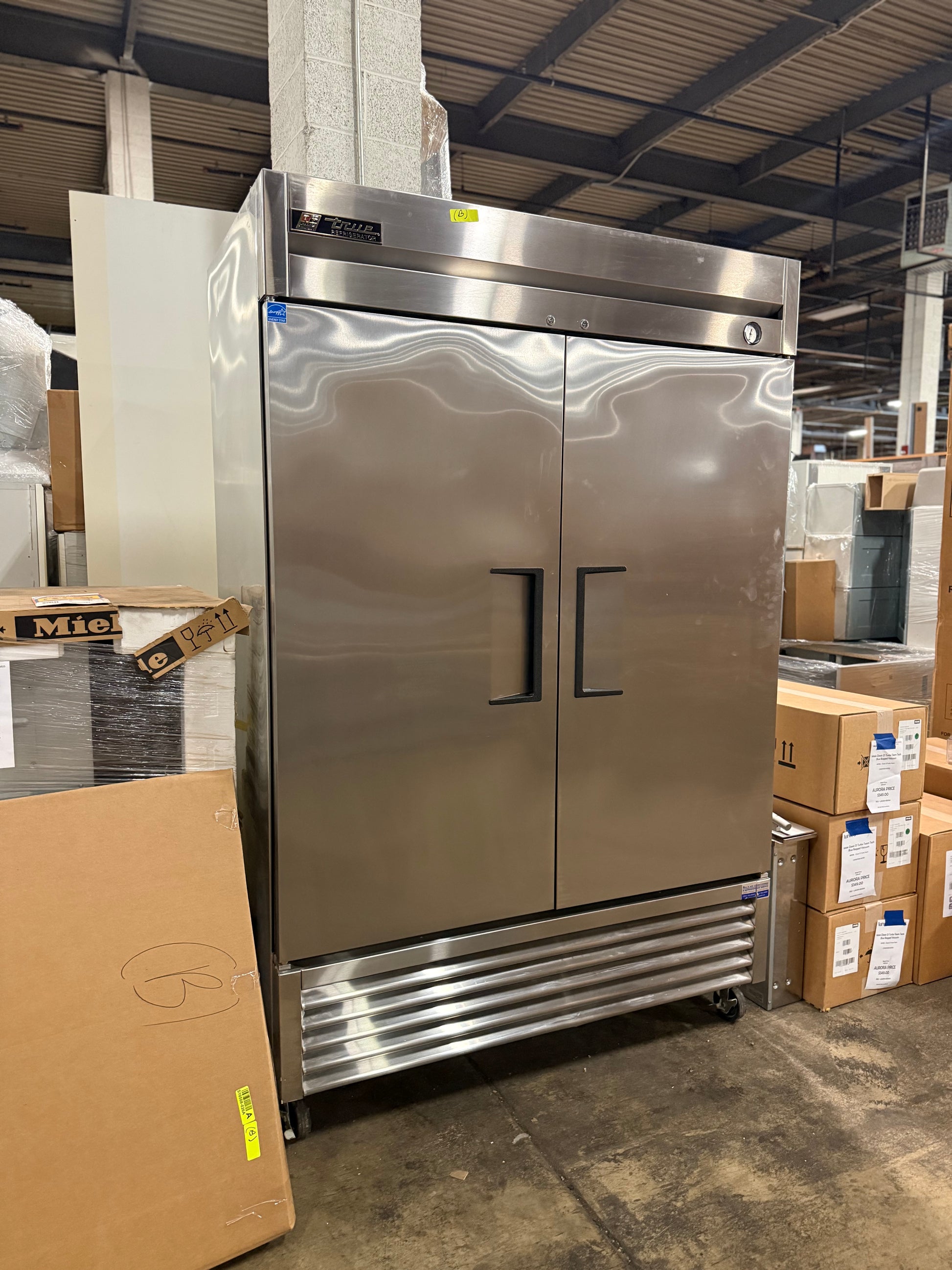 True T-49-HC 54 inch two-section commercial reach-in refrigerator with solid doors