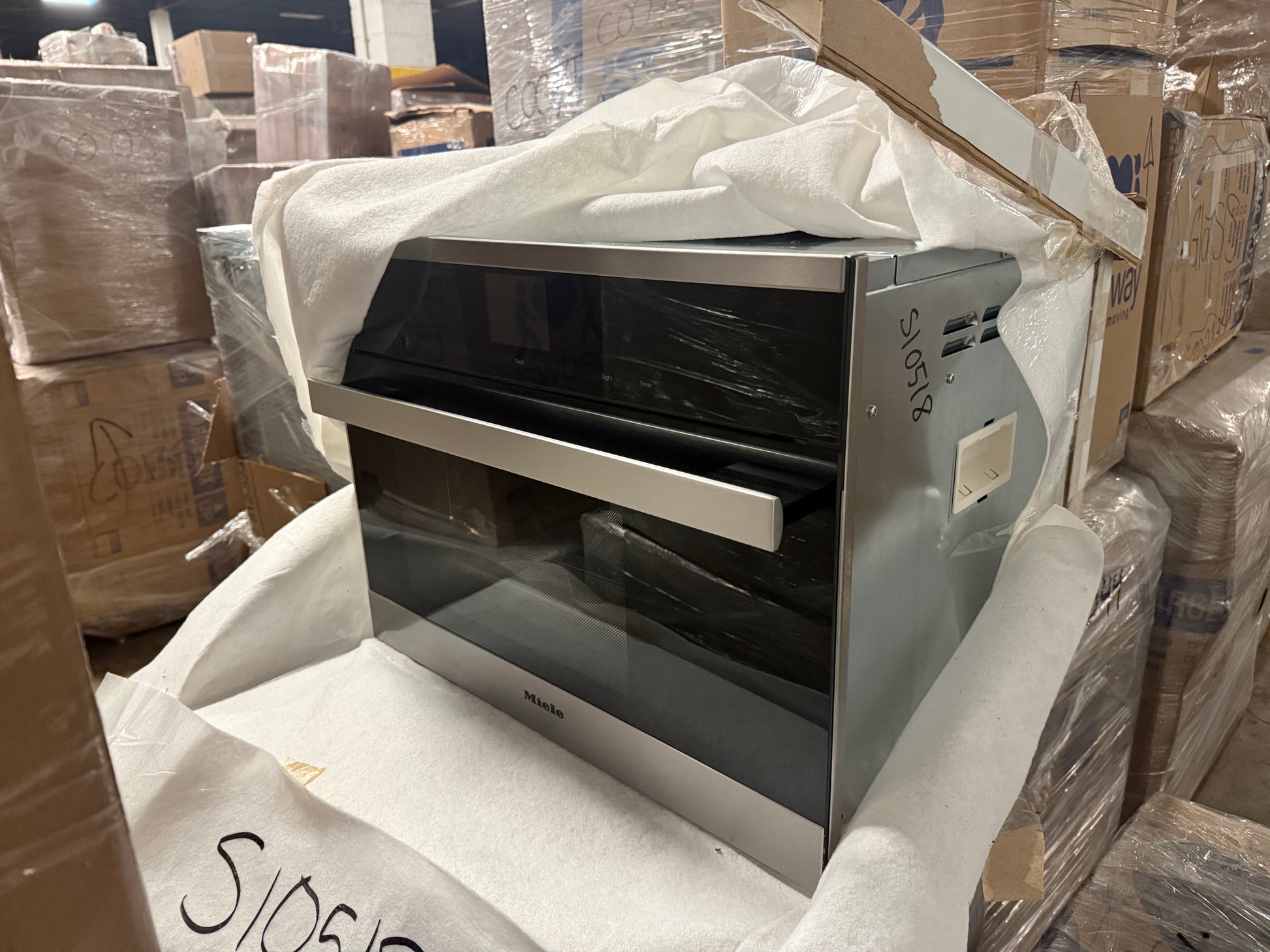 Miele DG6600 24 inch PureLine combi-steam oven in stainless steel and black glass