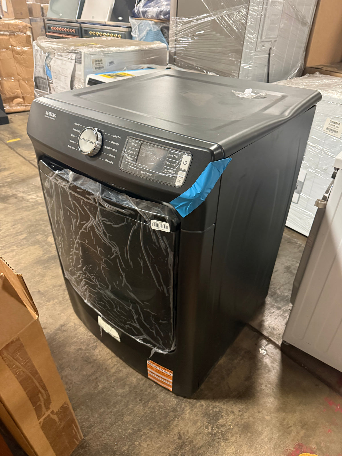 Modern high capacity laundry appliance with commercial grade internal components